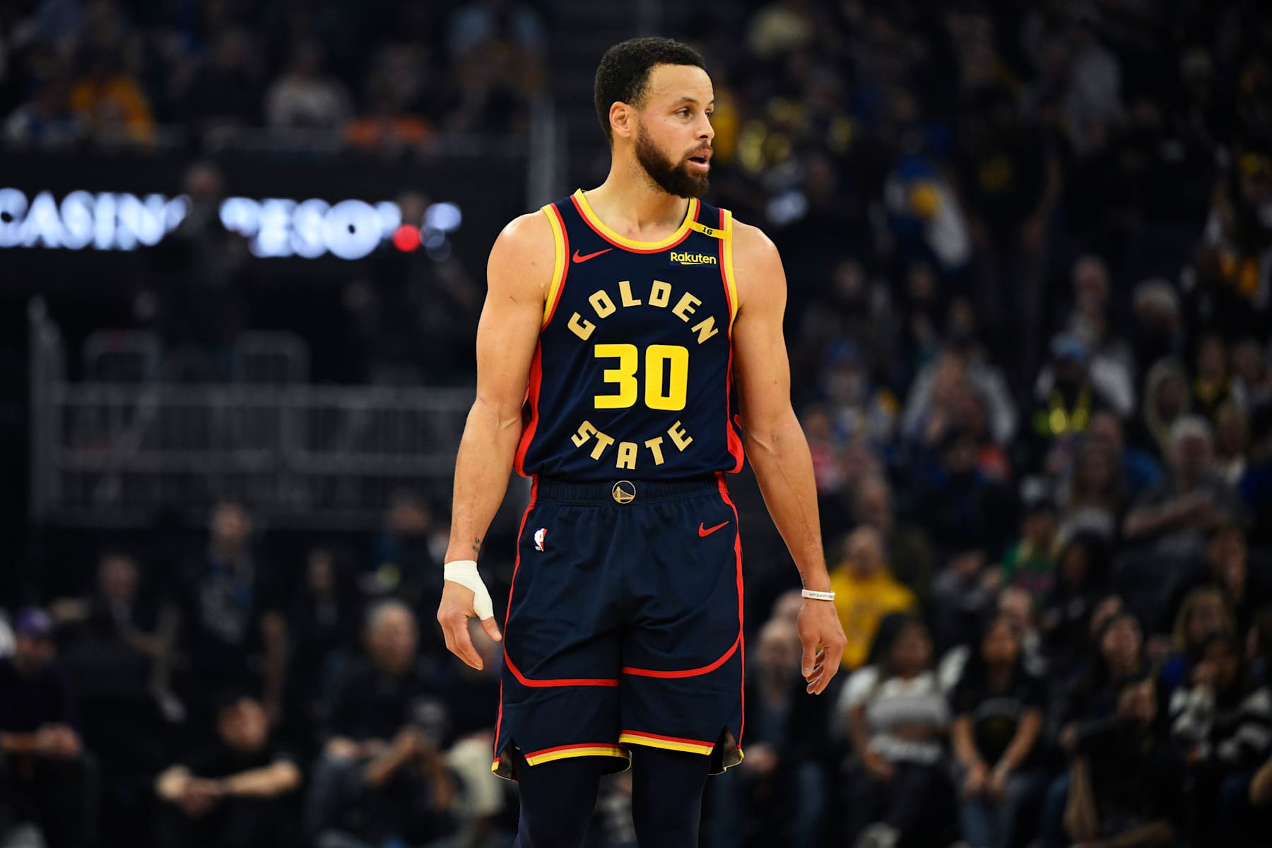 SAN FRANCISCO, CALIFORNIA - JANUARY 05: Stephen Curry #30 of the Golden State Warriors looks on against the Sacramento Kings in the first quarter at Chase Center on January 05, 2025 in San Francisco, California. NOTE TO USER: User expressly acknowledges and agrees that, by downloading and or using this photograph, User is consenting to the terms and conditions of the Getty Images License Agreement. (Photo by Eakin Howard/Getty Images)
