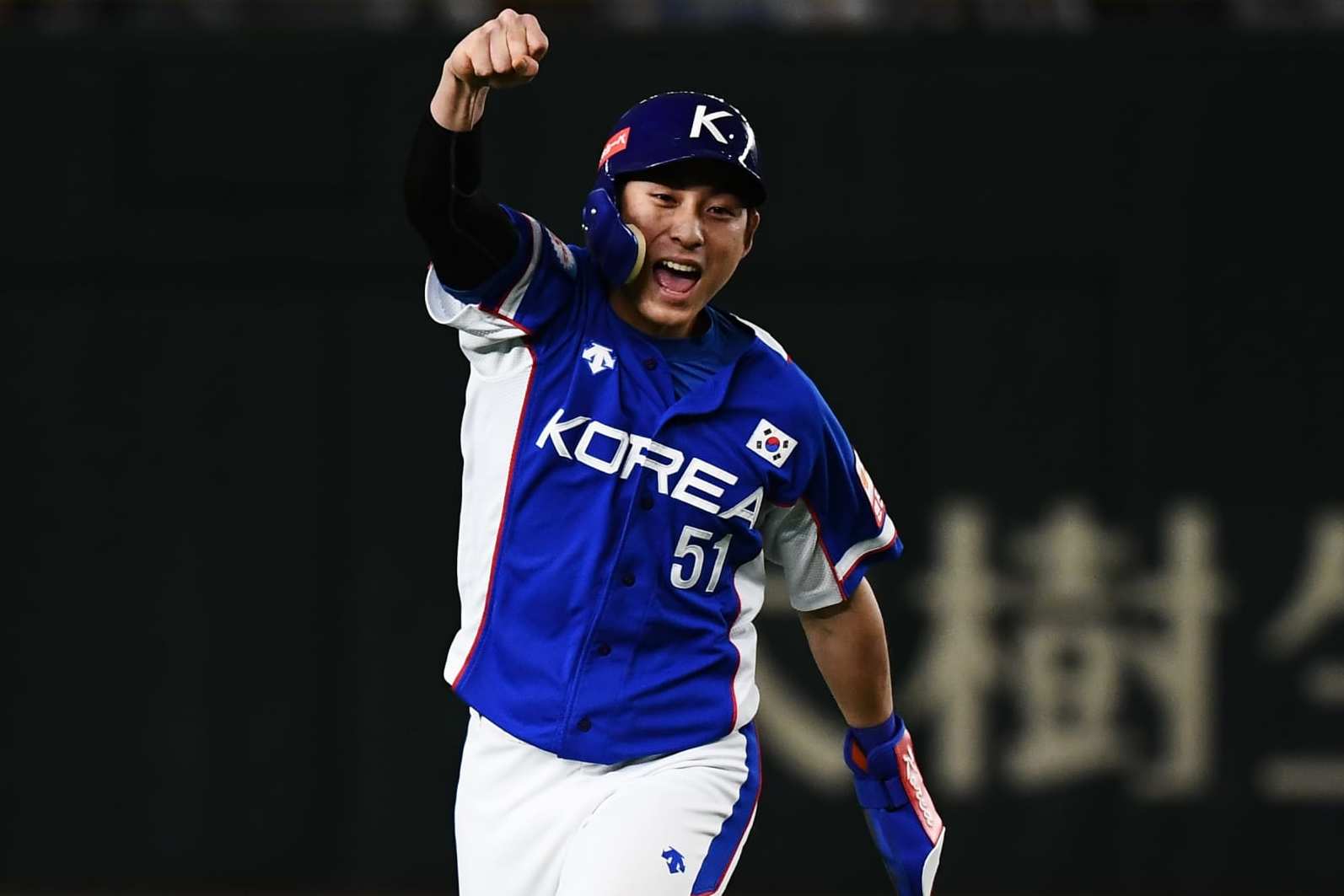 Jung-Hoo Lee of South Korea celebrates a home run of Ha Seong Kim during the WBSC Premier 12 Super Round Final baseball game between South Korea and Japan, at the Tokyo Dome in Tokyo on November 17, 2019. (Photo by CHARLY TRIBALLEAU / AFP) (Photo by CHARLY TRIBALLEAU/AFP via Getty Images)
