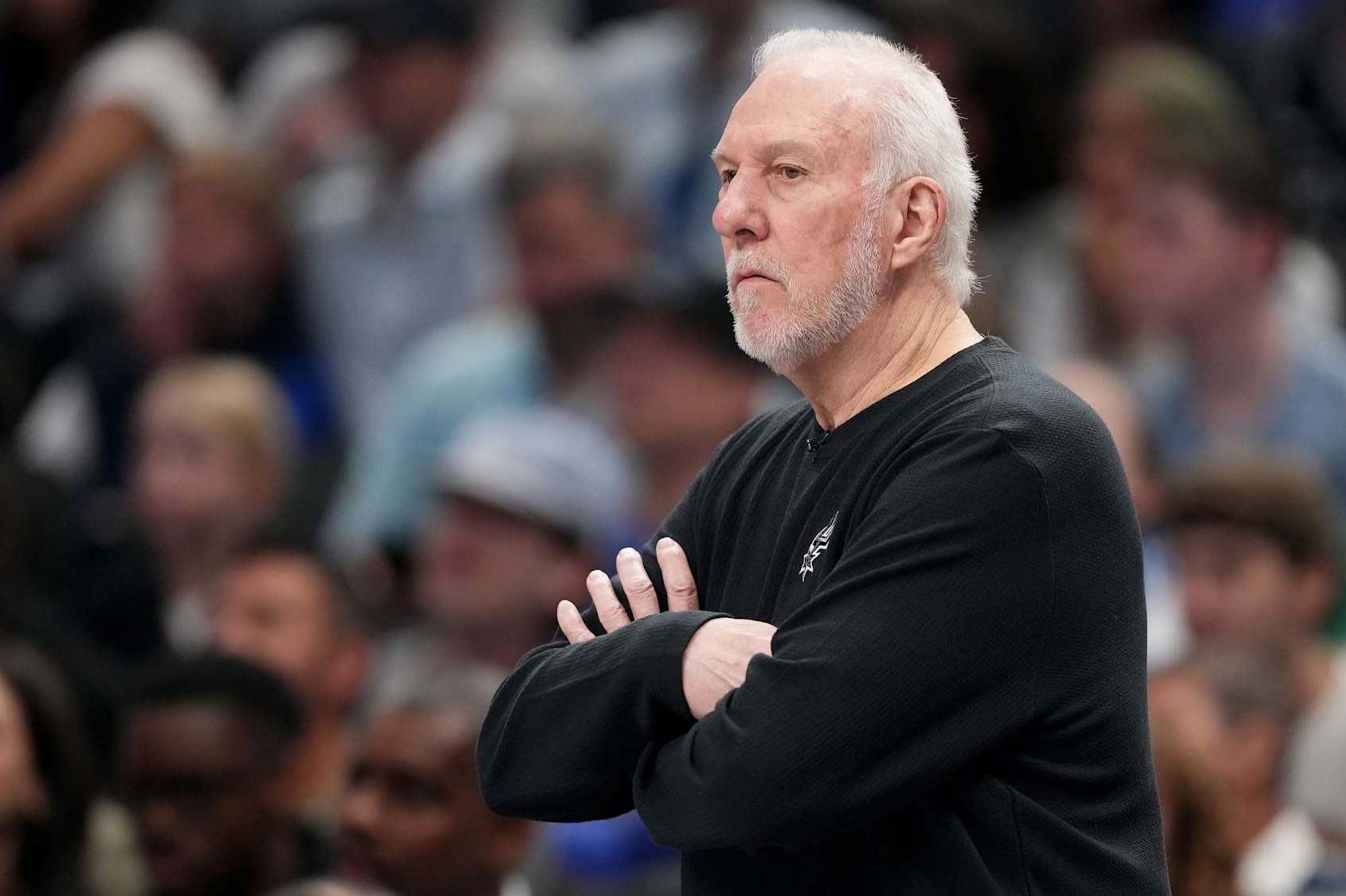 DALLAS, TEXAS - OCTOBER 24: Head coach Gregg Popovich of the San Antonio Spurs looks on while playing the Dallas Mavericks during the first quarter of the game at American Airlines Center on October 24, 2024 in Dallas, Texas.  NOTE TO USER: User expressly acknowledges and agrees that, by downloading and or using this photograph, User is consenting to the terms and conditions of the Getty Images License Agreement. (Photo by Sam Hodde/Getty Images)