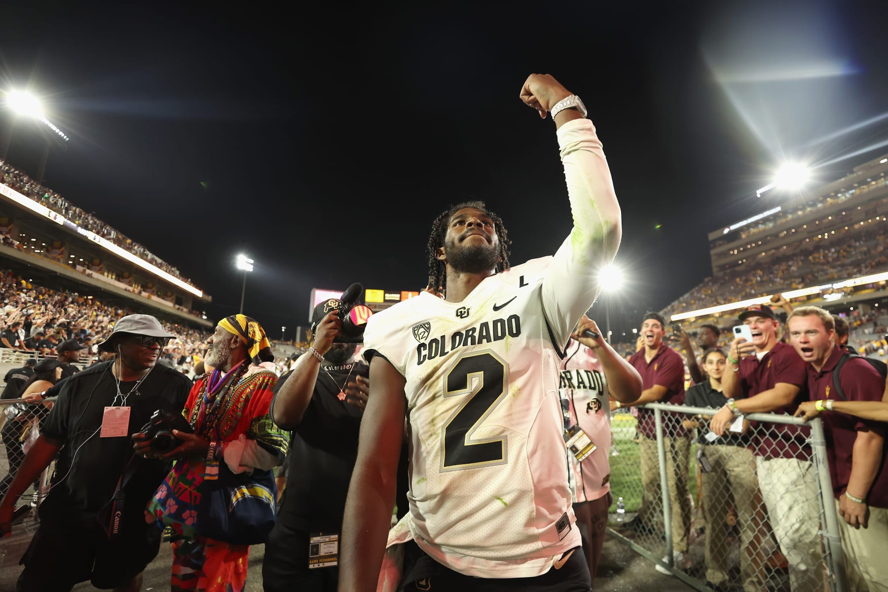 TEMPE, ARIZONA - OCTOBER 07: Quarterback Shedeur Sanders #2 of the Colorado Buffaloes celebrates as he walks off the field following the NCAAF game against the Arizona State Sun Devils at Mountain America Stadium on October 07, 2023 in Tempe, Arizona. The Buffaloes defeated the Sun Devils 27-24.  (Photo by Christian Petersen/Getty Images)