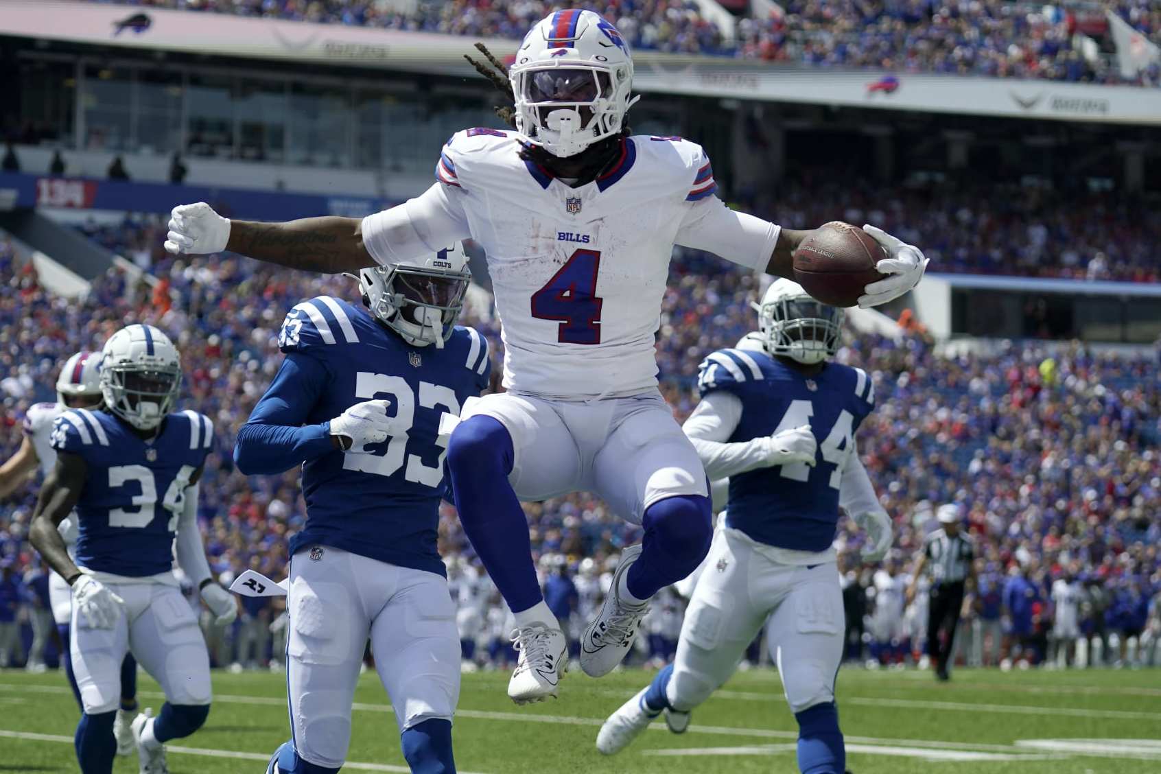 Washington Commanders quarterback Sam Howell (14) warms up prior to the  start of an NFL pre-season football game against the Cleveland Browns,  Friday, Aug. 11, 2023, in Cleveland. (AP Photo/Kirk Irwin Stock