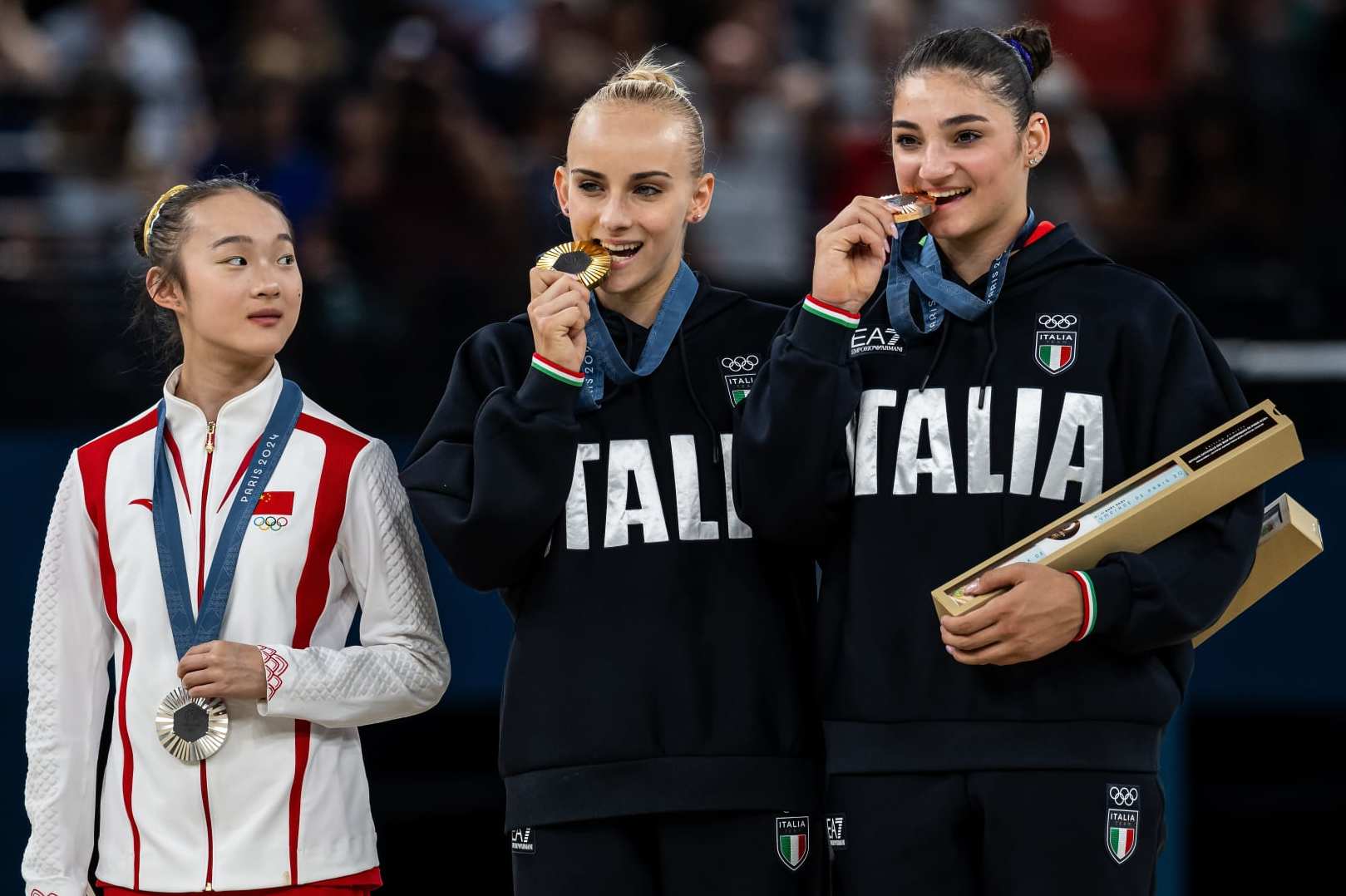 PARIS, FRANCE - AUGUST 05: Silver medal winner Yaqin Zhou of China, Gold medal winner Alice D'Amato of Italy and Bronze medal winner Manila Esposito (L-R) show their medals while women´s balance beam finale of Italy  on day ten of the Olympic Games Paris 2024 at Bercy Arena on August 05, 2024 in Paris, France. (Photo by Markus Gilliar - GES Sportfoto/Getty Images)