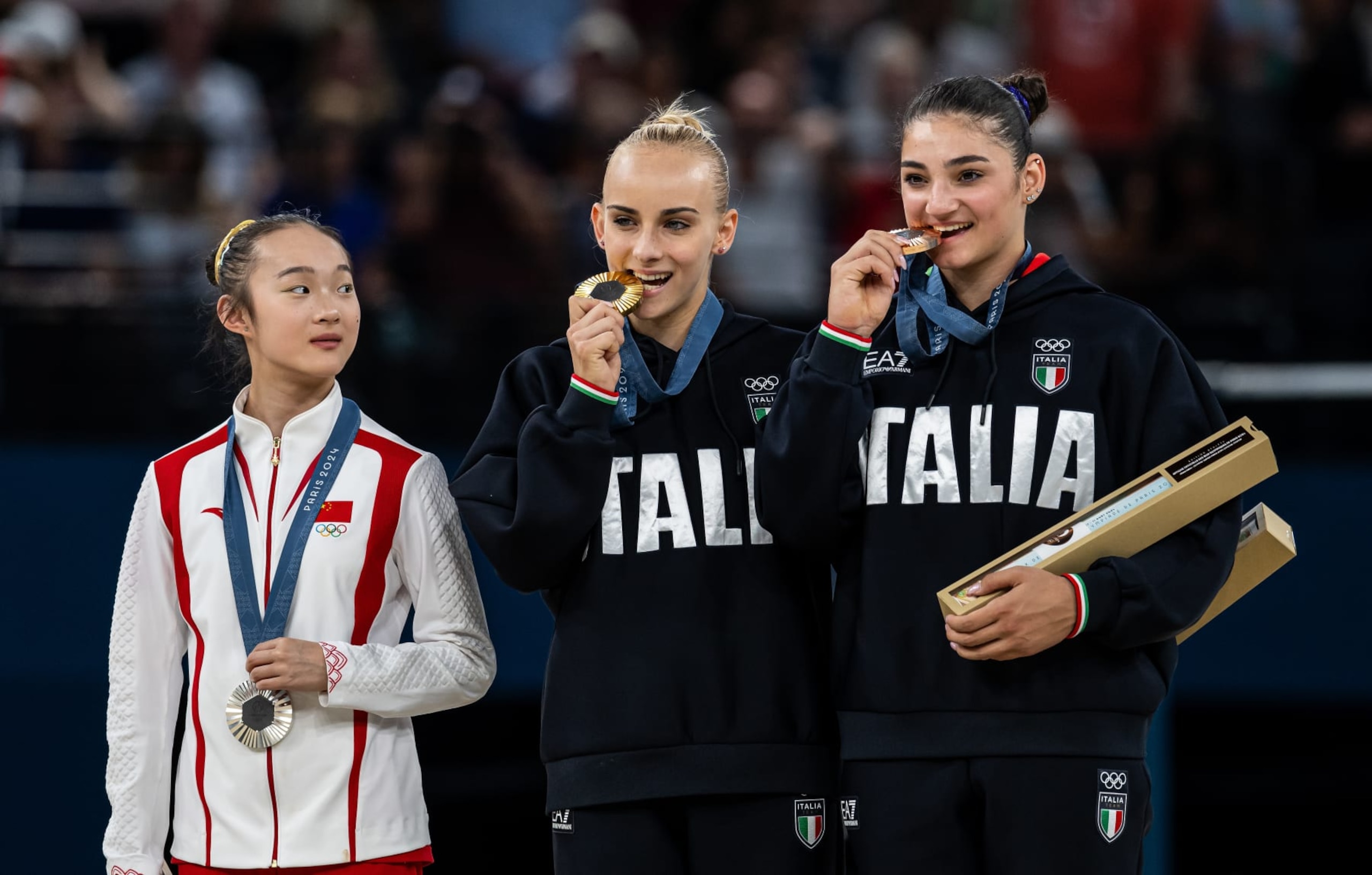 PARIS, FRANCE - AUGUST 05: Silver medal winner Yaqin Zhou of China, Gold medal winner Alice D'Amato of Italy and Bronze medal winner Manila Esposito (L-R) show their medals while women´s balance beam finale of Italy on day ten of the Olympic Games Paris 2024 at Bercy Arena on August 05, 2024 in Paris, France. (Photo by Markus Gilliar - GES Sportfoto/Getty Images) PARIS, FRANCE - AUGUST 05: Silver medal winner Yaqin Zhou of China, Gold medal winner Alice D'Amato of Italy and Bronze medal winner Manila Esposito (L-R) show their medals while women´s balance beam finale of Italy on day ten of the Olympic Games Paris 2024 at Bercy Arena on August 05, 2024 in Paris, France. (Photo by Markus Gilliar - GES Sportfoto/Getty Images)