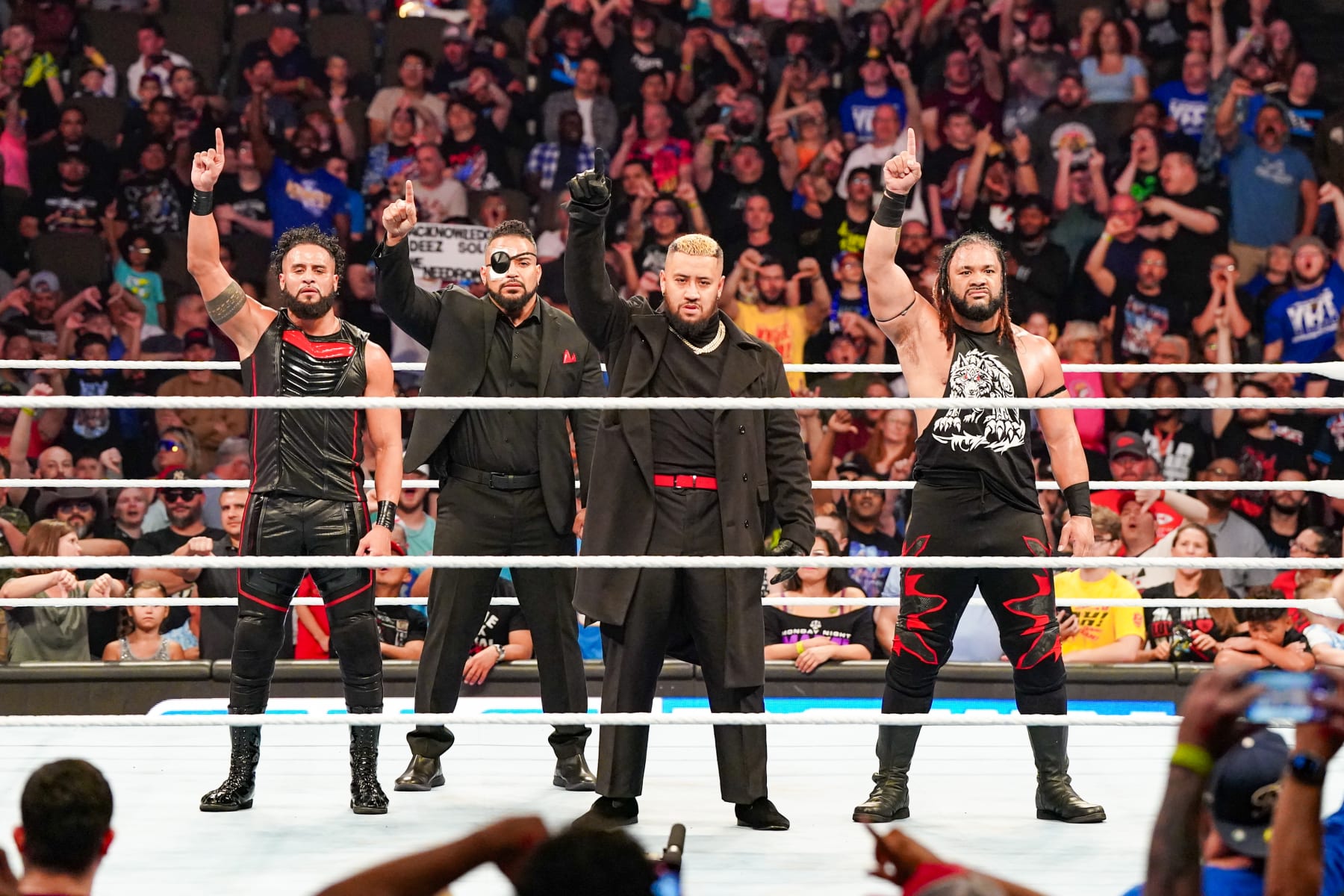 OMAHA, NEBRASKA - JULY 26: The Bloodline, Tama Tonga, Tonga Loa, Solo Siko and Jacob Fatu are victorious during SmackDown at CHI Health Center on July 26, 2024 in Omaha, Nebraska.  (Photo by WWE/Getty Images)