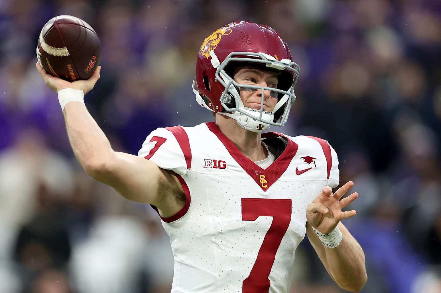 SEATTLE, WASHINGTON - NOVEMBER 02: Miller Moss #7 of the USC Trojans passes against the Washington Huskies during the first half at Husky Stadium on November 02, 2024 in Seattle, Washington. (Photo by Steph Chambers/Getty Images)