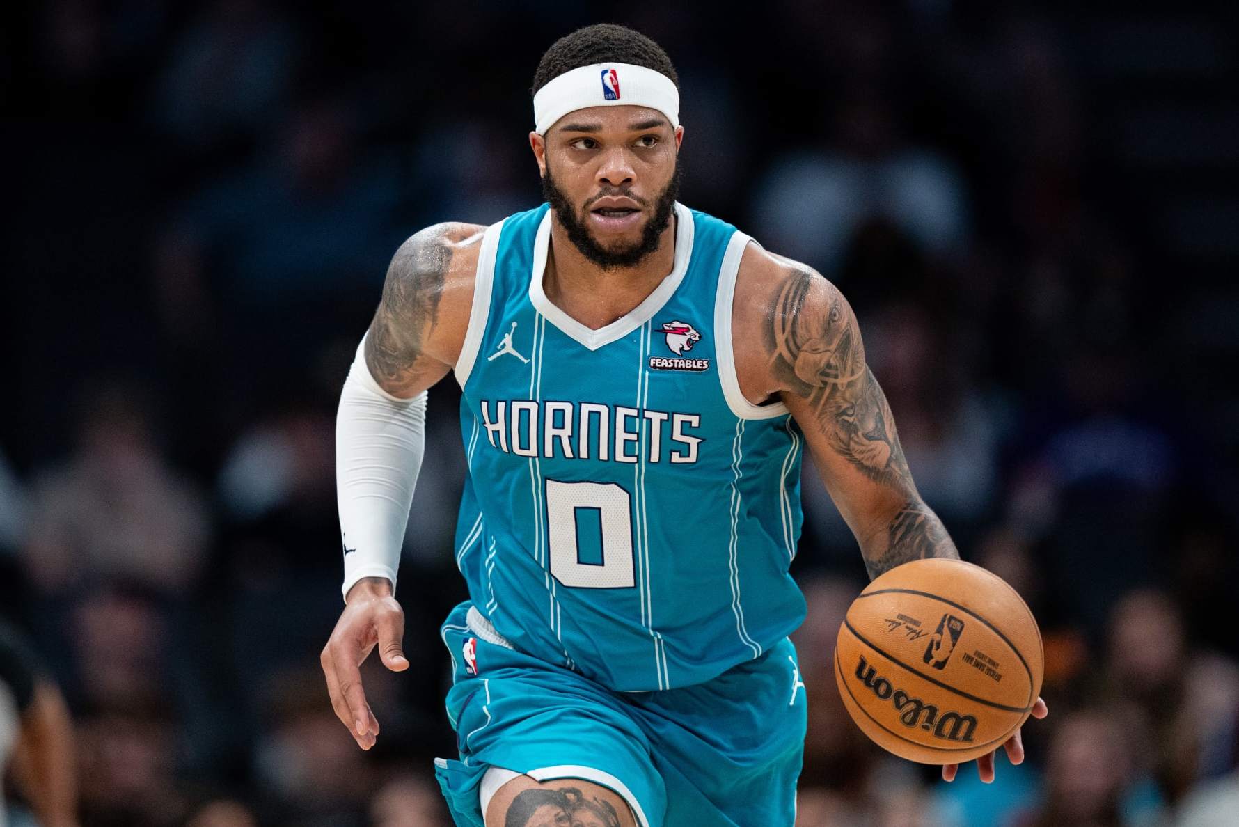 CHARLOTTE, NORTH CAROLINA - JANUARY 27: Miles Bridges #0 of the Charlotte Hornets brings the ball up court against the Utah Jazz during their game at Spectrum Center on January 27, 2024 in Charlotte, North Carolina. NOTE TO USER: User expressly acknowledges and agrees that, by downloading and or using this photograph, User is consenting to the terms and conditions of the Getty Images License Agreement. (Photo by Jacob Kupferman/Getty Images)