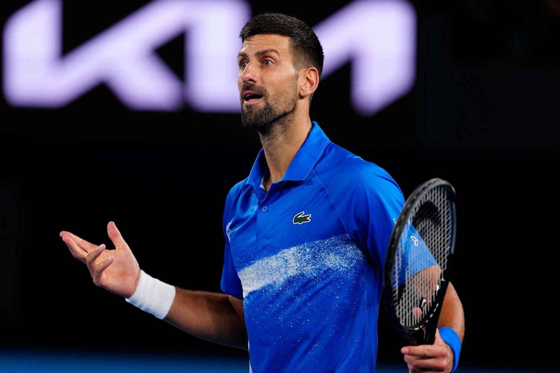 MELBOURNE, AUSTRALIA - JANUARY 19: Novak Djokovic of Serbia in action against Jiri Lehecka of the Czech Republic in the in the Men's Singles Fourth Round match during day eight of the 2025 Australian Open at Melbourne Park on January 19, 2025 in Melbourne, Australia. (Photo by Fred Lee/Getty Images)