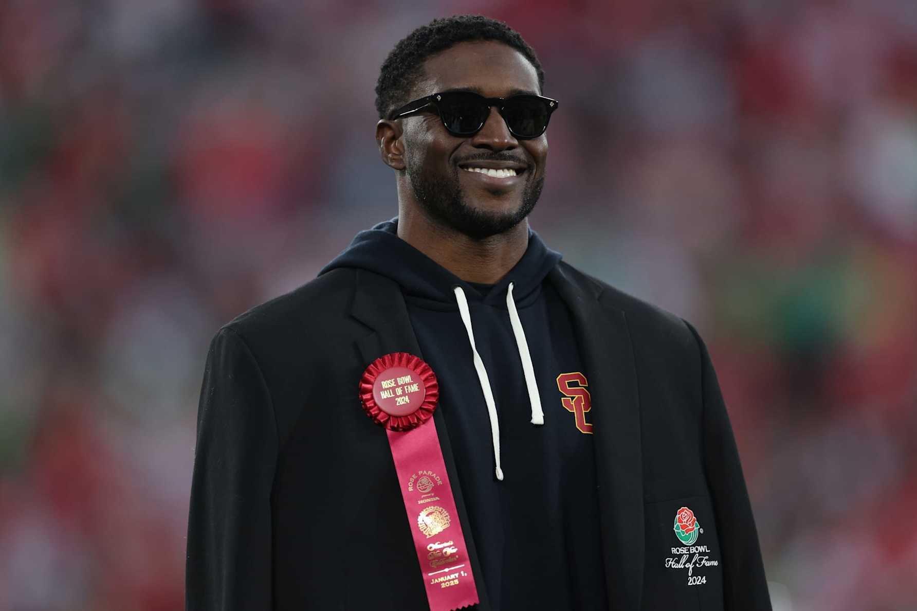 PASADENA, CALIFORNIA - JANUARY 01: Reggie Bush looks on after being inducted into the Rose Bowl Hall of Fame in the game between the Ohio State Buckeyes and the Oregon Ducks during the Rose Bowl Game Presented by Prudential at Rose Bowl Stadium on January 01, 2025 in Pasadena, California. (Photo by Harry How/Getty Images)