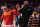 LOS ANGELES, CA - JANUARY 06: USC Trojans guard Bronny James (6) gives his dad LeBron James a high five before the college basketball game between the Stanford Cardinal and the USC Trojans on January 6, 2024 at Galen Center in Los Angeles, CA. (Photo by Brian Rothmuller/Icon Sportswire via Getty Images)