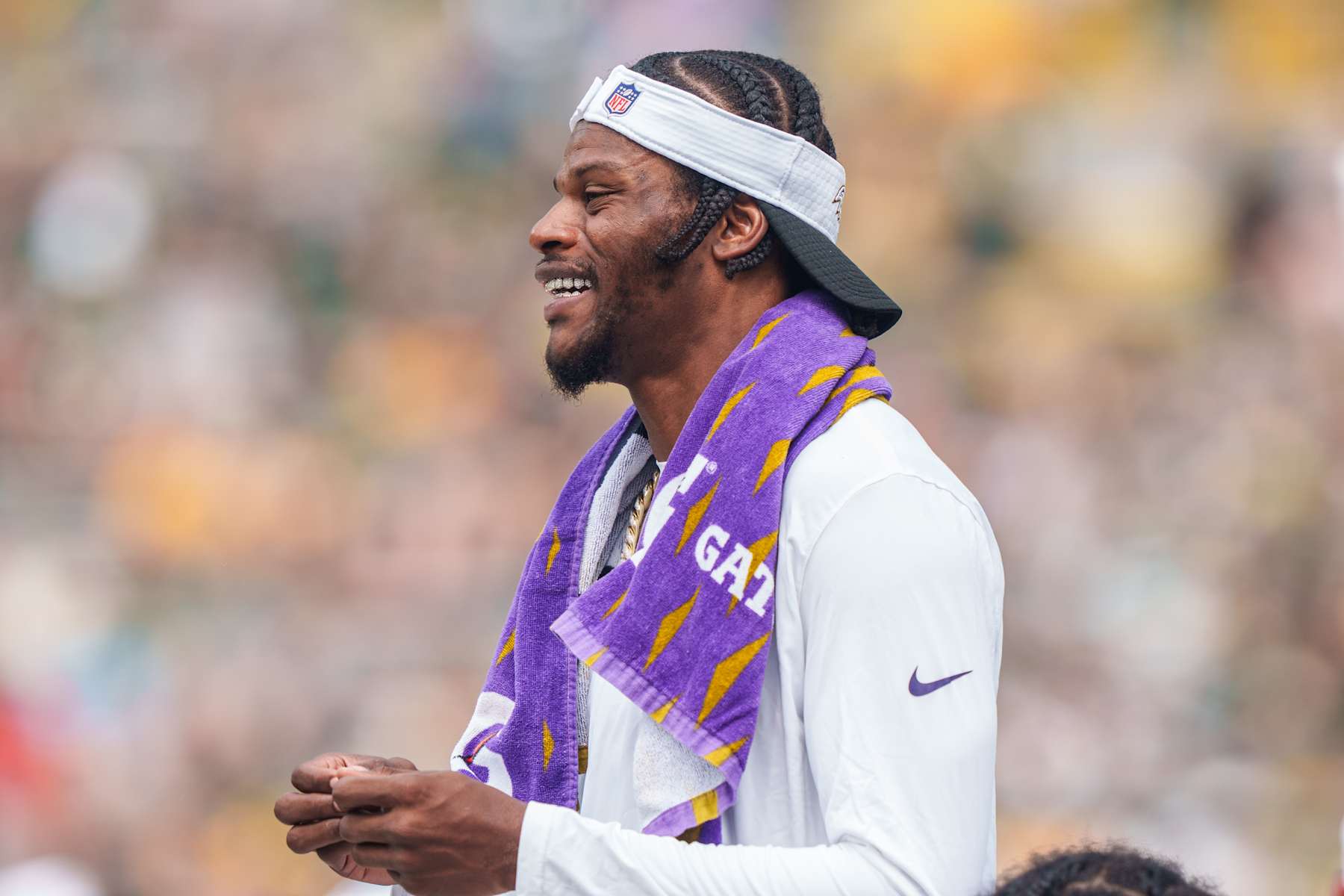 GREEN BAY, WI - AUGUST 24: Quarterback Lamar Jackson #9 of the Baltimore Ravens on the sidelines during the third quarter of an NFL preseason football game against the Green Bay Packers at Lambeau Field on August 24, 2024 in Green Bay, Wisconsin. (Photo by Todd Rosenberg/Getty Images)
