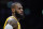 Los Angeles Lakers' LeBron James watches during the first half of an NBA basketball game against the Dallas Mavericks Thursday, Jan. 12, 2023, in Los Angeles. (AP Photo/Jae C. Hong)