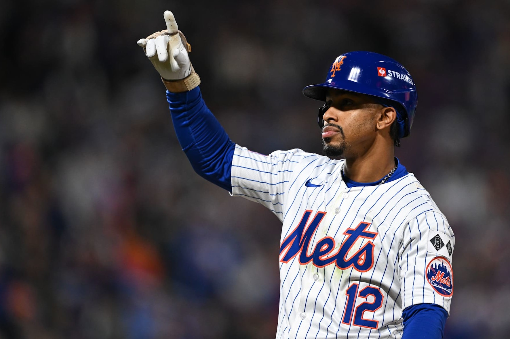 NEW YORK, NY - OCTOBER 17:   Francisco Lindor #12 of the New York Mets reacts after hitting a single in the third inning during Game 4 of the NLCS presented by loanDepot between the Los Angeles Dodgers and the New York Mets at Citi Field on Thursday, October 17, 2024 in New York, New York. (Photo by Drew Hallowell/MLB Photos via Getty Images)