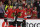FILE - Chicago Blackhawks' Patrick Kane (88) celebrates with teammate Jonathan Toews (19) after scoring a hat trick during the third period of an NHL hockey game against the Minnesota Wild in Chicago, in this Sunday, Dec. 15, 2019, file photo. The Chicago Blackhawks are going to remain the Blackhawks — and there is no sign of any change coming anytime soon. Speaking publicly Thursday, Dec. 17, 2020, for the first time since baseball's Cleveland Indians announced Monday they plan to change their name, Blackhawks CEO Danny Wirtz reiterated the same message the team shared this summer after lingering questions about Native American team names returned to the forefront. (AP Photo/Paul Beaty, File)