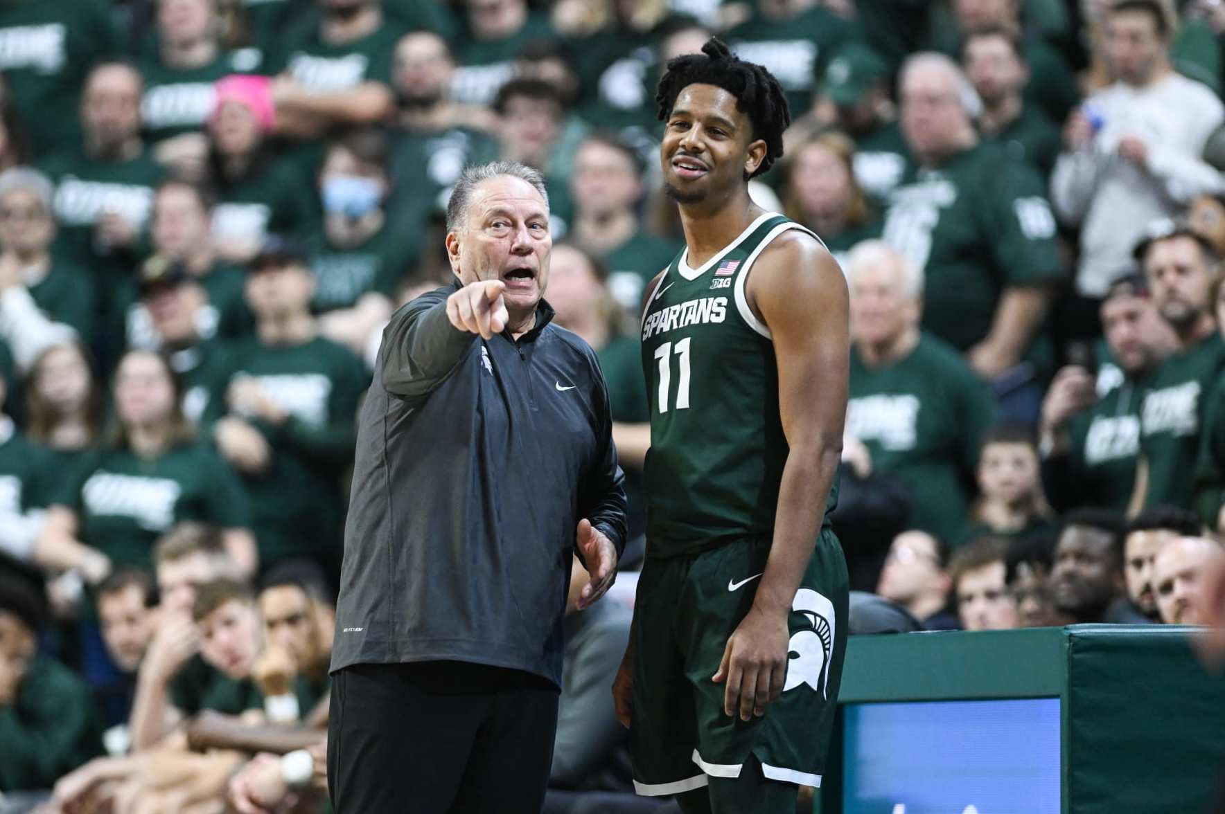 EAST LANSING, MI - JANUARY 04: Michigan State Spartans head coach Tom Izzo instructs guard A.J. Hoggard (11) between whistles during a college basketball game between the Michigan State Spartans and the Penn State Nittany Lions on January 4, 2024, at the Breslin Center in East Lansing, MI. (Photo by Adam Ruff/Icon Sportswire via Getty Images)