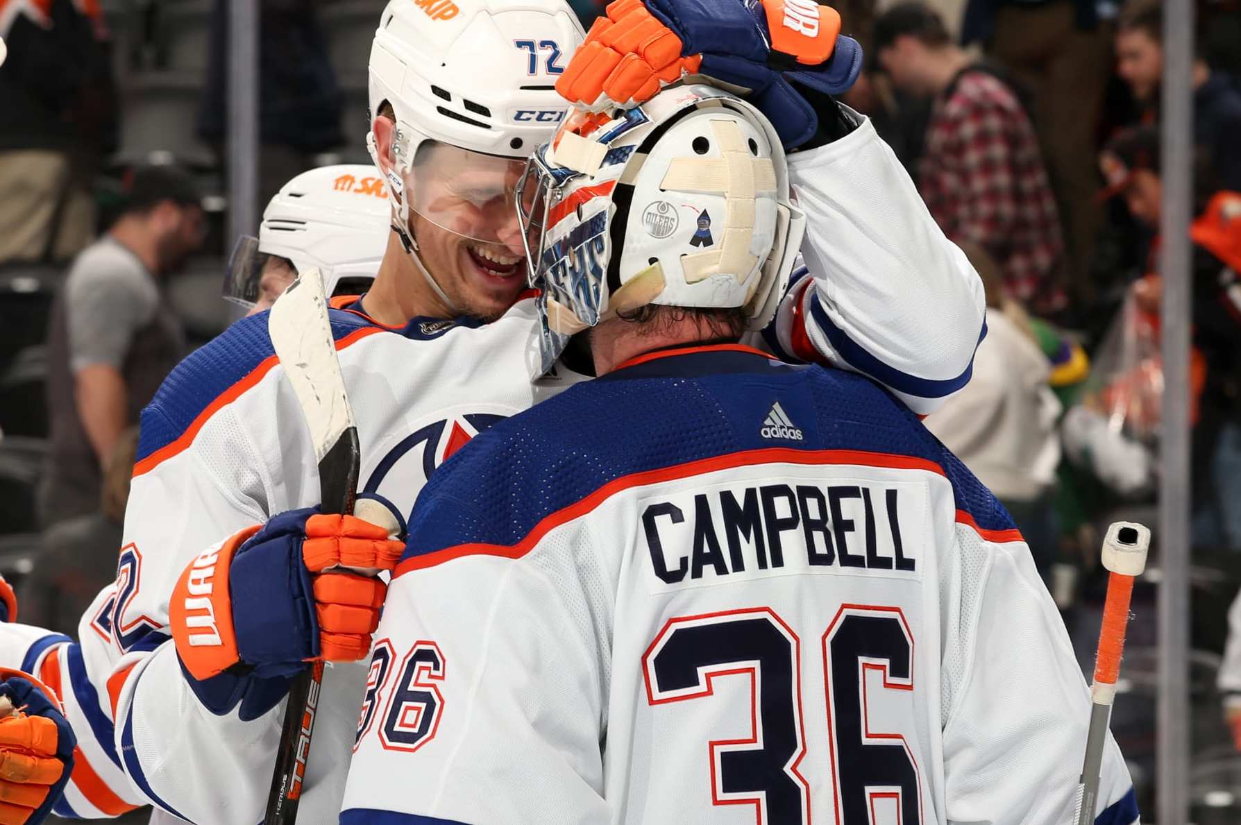 ANAHEIM, CA - APRIL 5: Nick Bjugstad #72 and Jack Campbell #36 of the Edmonton Oilers celebrate their win post game against the Anaheim Ducks at Honda Center on April 5, 2023 in Anaheim, California. (Photo by Debora Robinson/NHLI via Getty Images)