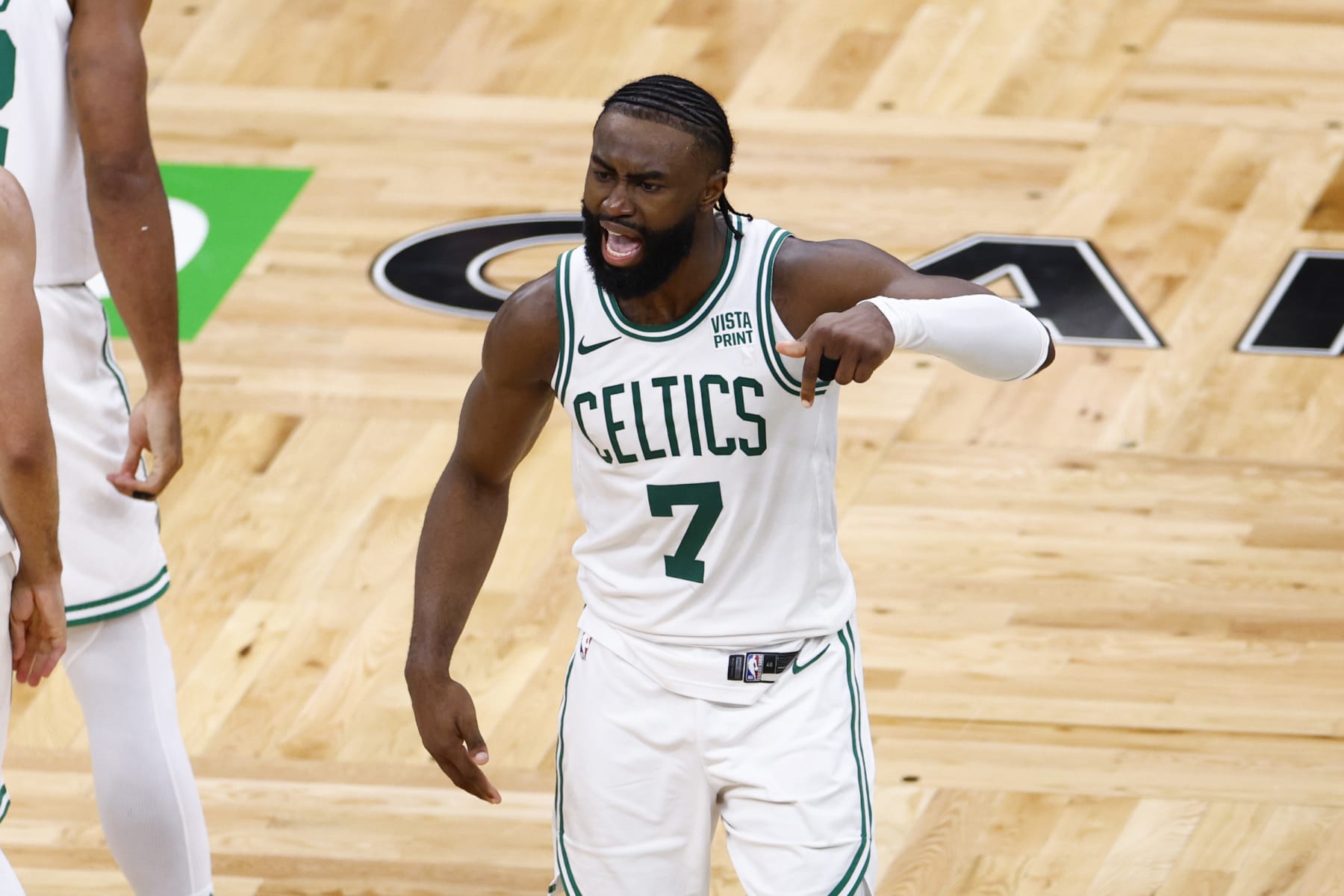 Boston, MA - May 21: Boston Celtics guard Jaylen Brown reacts after tying the game late in the fourth quarter of Game 1 of the 2024 Eastern Conference Finals. (Photo by Danielle Parhizkaran/The Boston Globe via Getty Images)