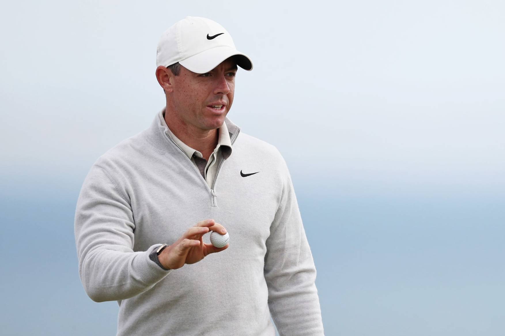 NORTH BERWICK, SCOTLAND - JULY 13: Rory McIlroy of Northern Ireland acknowledges the crowd on the 14th green during Day One of the Genesis Scottish Open at The Renaissance Club on July 13, 2023 in United Kingdom. (Photo by Jared C. Tilton/Getty Images)