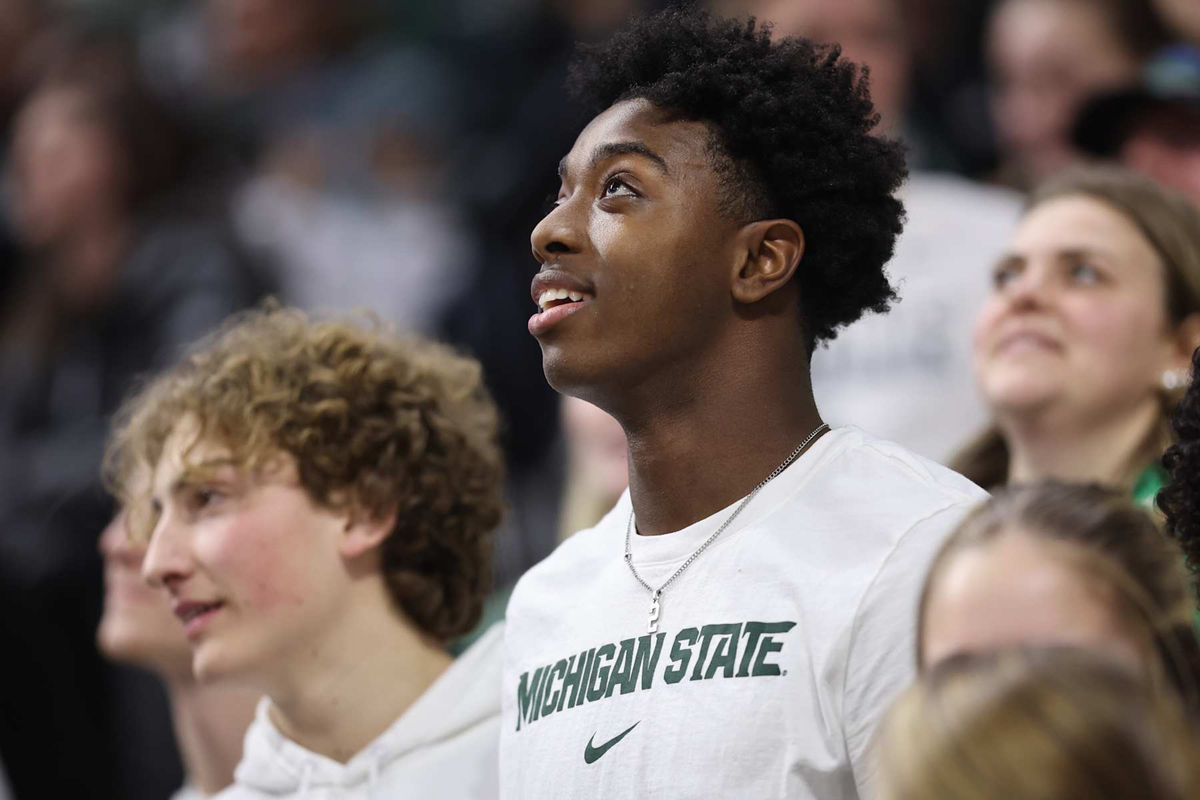 EAST LANSING, MICHIGAN - JANUARY 18: Michigan State Spartans football player Aidan Chiles watches the Minnesota Golden Gophers and the Michigan State Spartans game at Breslin Center on January 18, 2024 in East Lansing, Michigan. (Photo by Rey Del Rio/Getty Images) EAST LANSING, MICHIGAN - JANUARY 18: Michigan State Spartans football player Aidan Chiles watches the Minnesota Golden Gophers and the Michigan State Spartans game at Breslin Center on January 18, 2024 in East Lansing, Michigan. (Photo by Rey Del Rio/Getty Images)