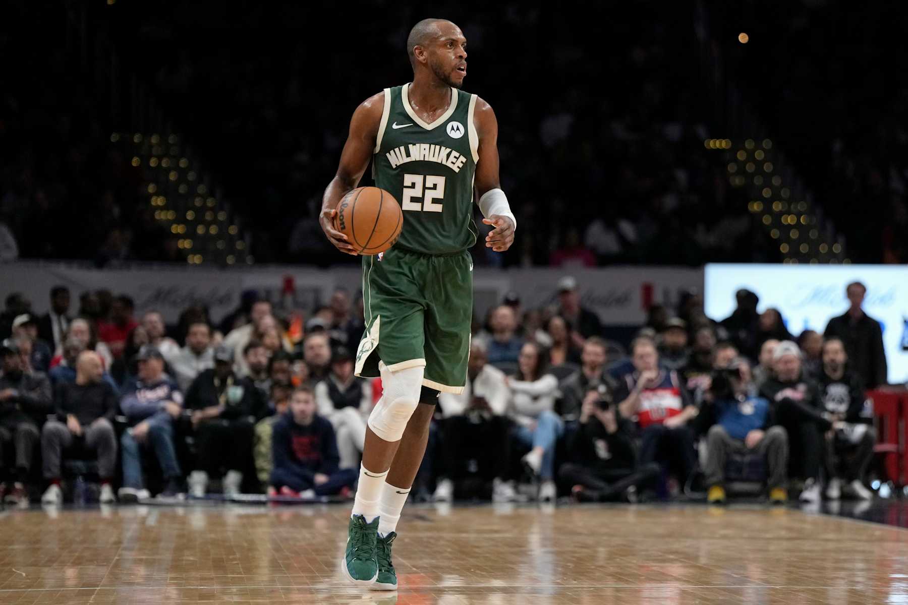 WASHINGTON, DC - APRIL 02: Khris Middleton #22 of the Milwaukee Bucks dribbles the ball down the court during the first half against the Washington Wizards at Capital One Arena on April 02, 2024 in Washington, DC. NOTE TO USER: User expressly acknowledges and agrees that, by downloading and or using this photograph, User is consenting to the terms and conditions of the Getty Images License Agreement. (Photo by Jess Rapfogel/Getty Images)