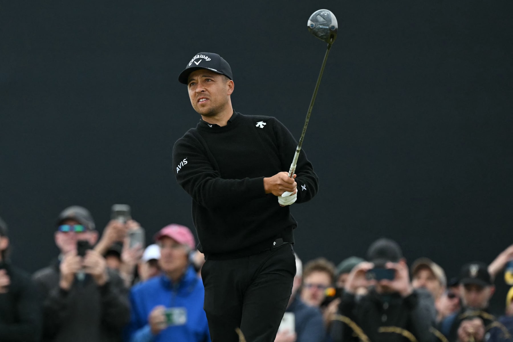 US golfer Xander Schauffele watches his drive from the 15th tee during his final round,  on day four of the 152nd British Open Golf Championship at Royal Troon on the south west coast of Scotland on July 21, 2024. (Photo by Glyn KIRK / AFP) / RESTRICTED TO EDITORIAL USE (Photo by GLYN KIRK/AFP via Getty Images)