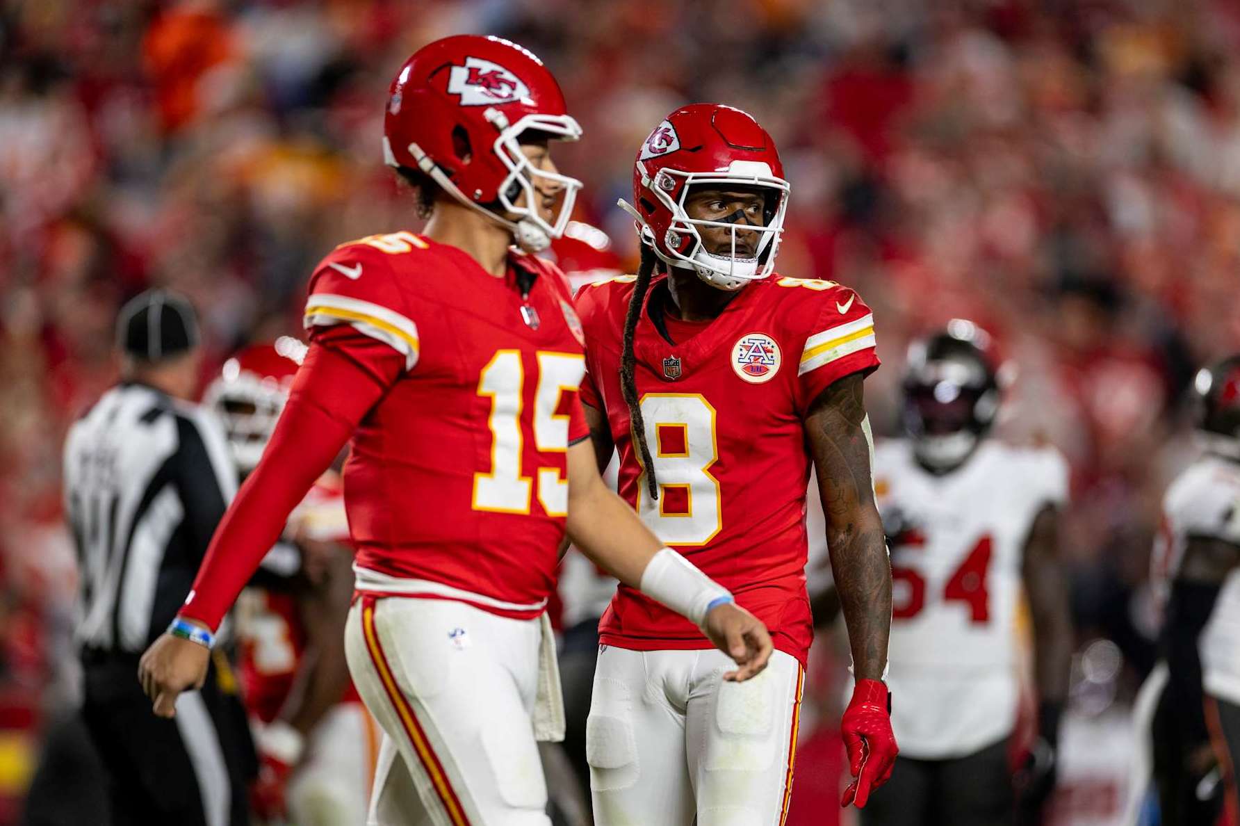 KANSAS CITY, MISSOURI - NOVEMBER 04: DeAndre Hopkins #8 of the Kansas City Chiefs and Patrick Mahomes #15 of the Kansas City Chiefs look on during an NFL Football game against the Tampa Bay Buccaneers at GEHA Field at Arrowhead Stadium on November 04, 2024 in Kansas City, Missouri. (Photo by Michael Owens/Getty Images)