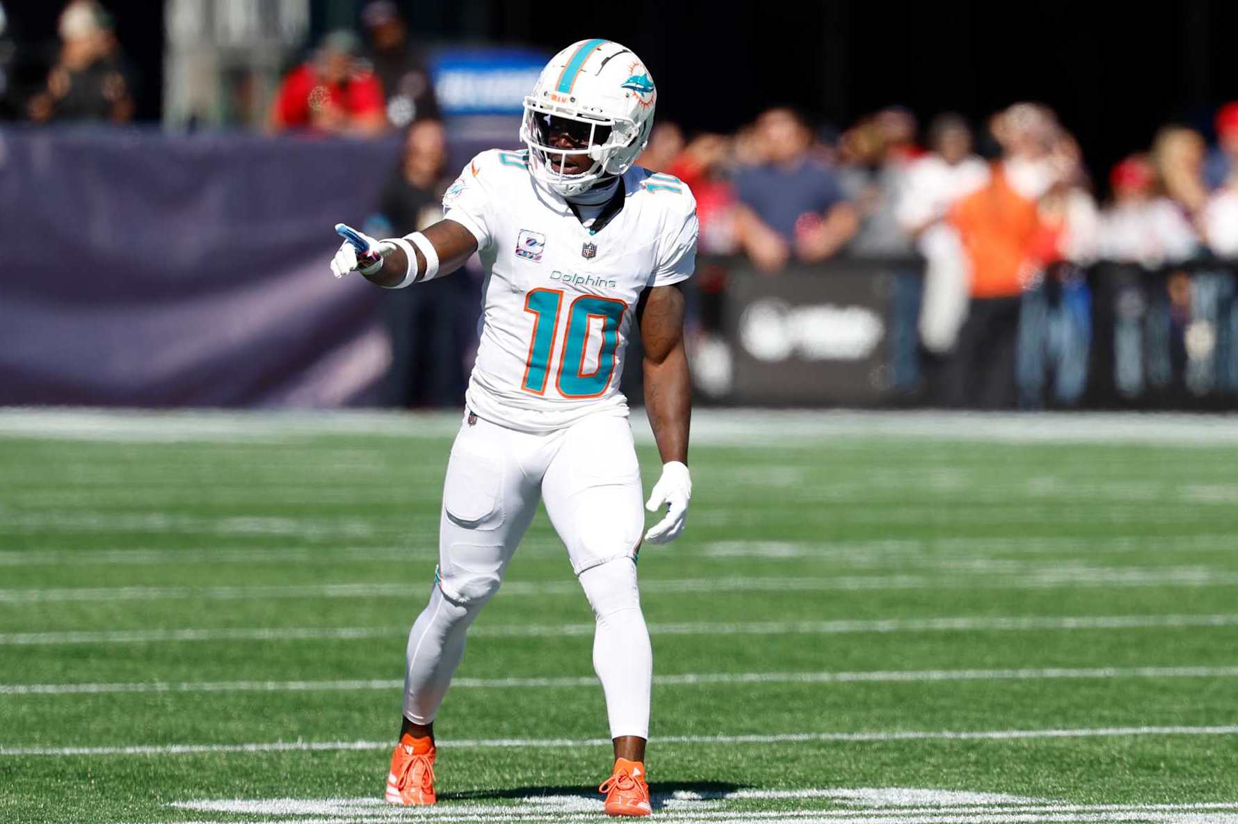 FOXBOROUGH, MA - OCTOBER 06: Miami Dolphins wide receiver Tyreek Hill (10) checks with the line judge during a game between the New England Patriots and the Miami Dolphins on October 6, 2024, at Gillette Stadium in Foxborough, Massachusetts. (Photo by Fred Kfoury III/Icon Sportswire via Getty Images)