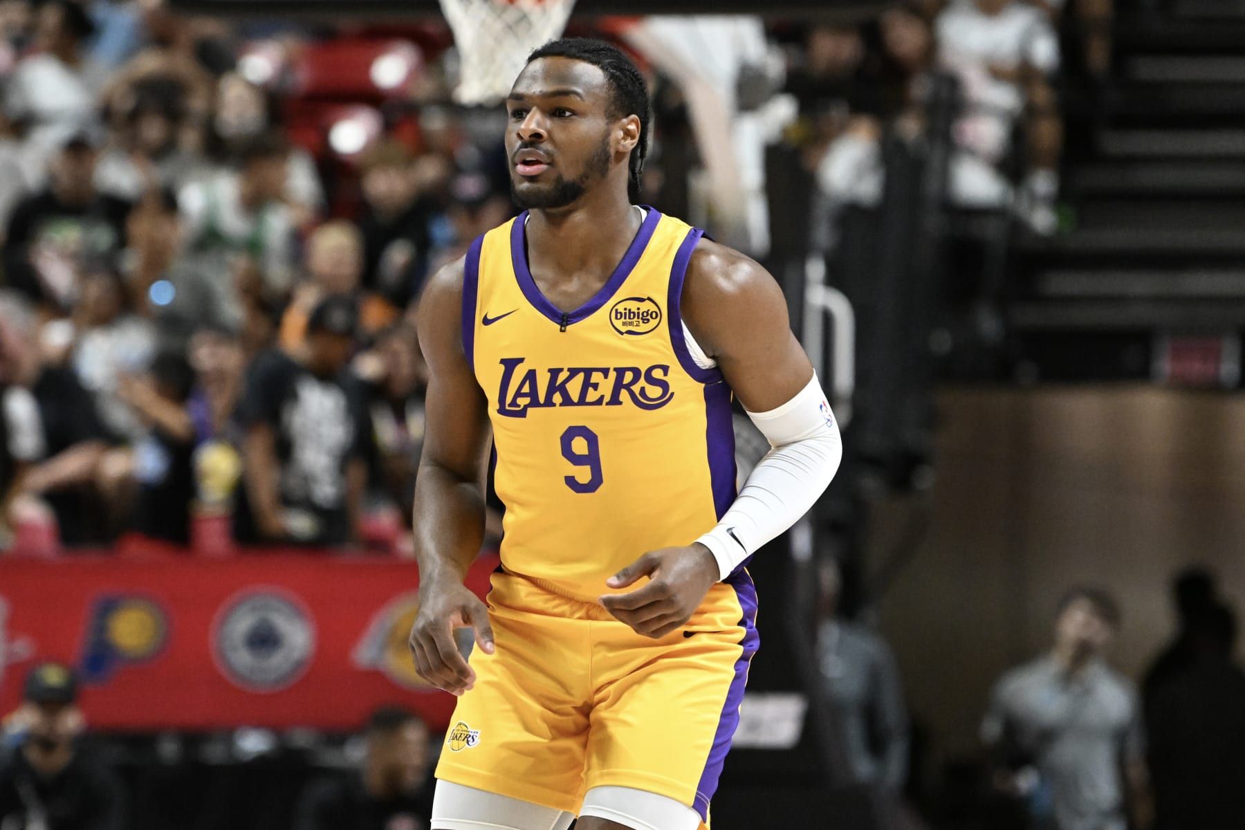 LAS VEGAS, NEVADA - JULY 17: Bronny James Jr. #9 of the Los Angeles Lakers looks on against the Atlanta Hawks in the first half of a 2024 NBA Summer League game at the Thomas & Mack Center on July 17, 2024 in Las Vegas, Nevada. The Lakers defeated the Hawks 87-86. NOTE TO USER: User expressly acknowledges and agrees that, by downloading and or using this photograph, User is consenting to the terms and conditions of the Getty Images License Agreement. (Photo by Candice Ward/Getty Images)