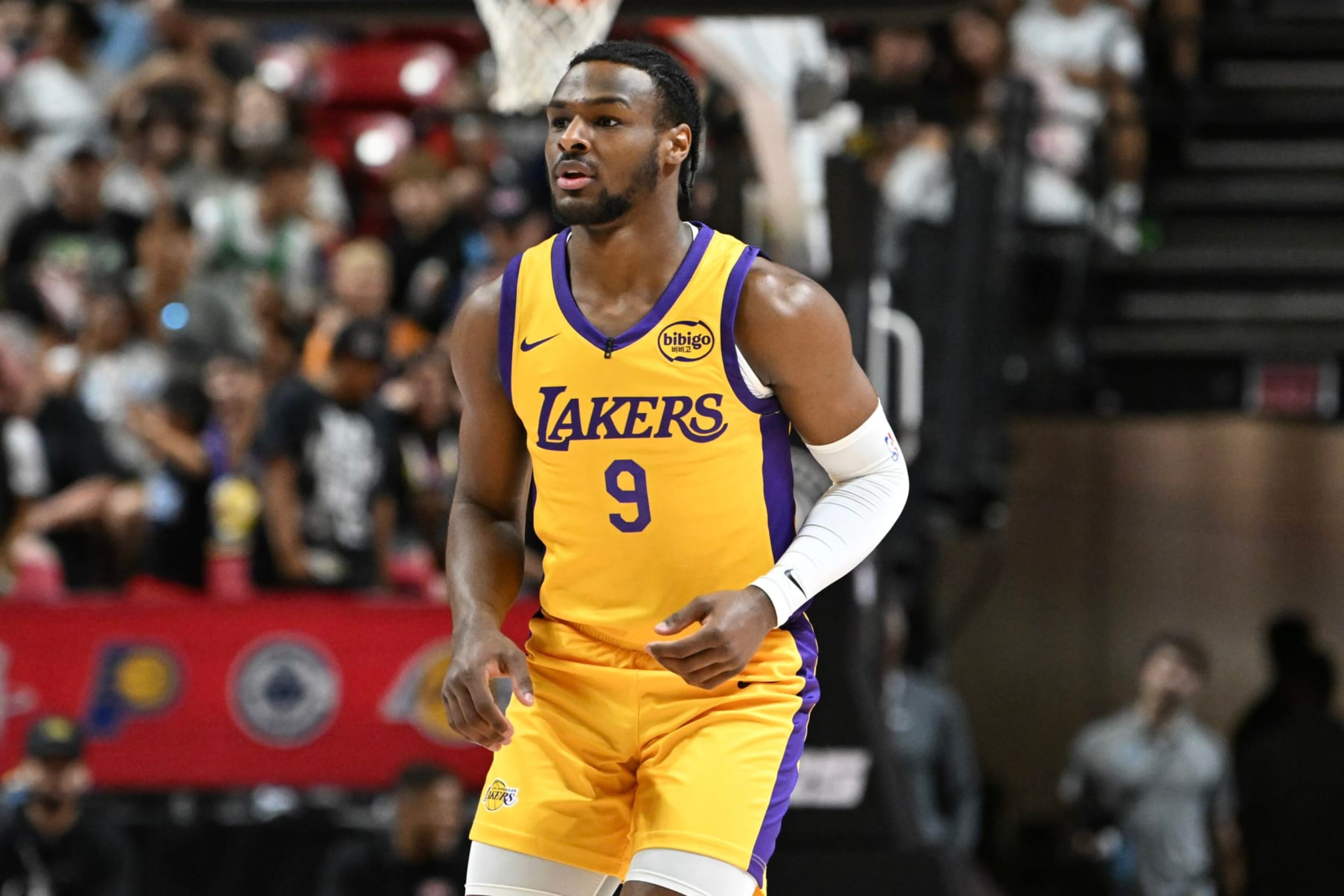 LAS VEGAS, NEVADA - JULY 17: Bronny James Jr. #9 of the Los Angeles Lakers looks on against the Atlanta Hawks in the first half of a 2024 NBA Summer League game at the Thomas & Mack Center on July 17, 2024 in Las Vegas, Nevada. The Lakers defeated the Hawks 87-86. NOTE TO USER: User expressly acknowledges and agrees that, by downloading and or using this photograph, User is consenting to the terms and conditions of the Getty Images License Agreement. (Photo by Candice Ward/Getty Images)