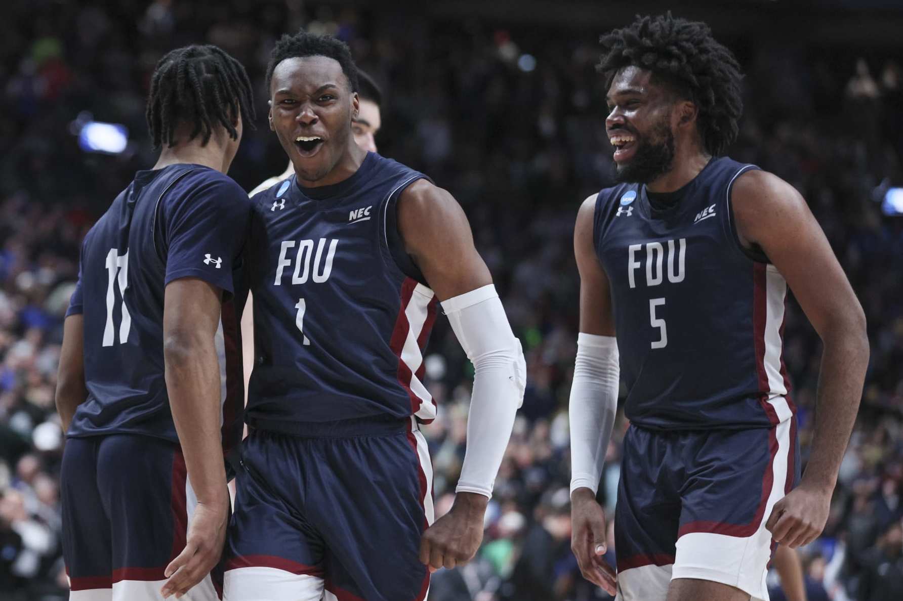 COLUMBUS, OHIO - MARCH 17: Joe Munden Jr. #1 of the Fairleigh Dickinson Knights reacts in the second half of a game against the Purdue Boilermakers in the first round of the NCAA Men's Basketball Tournament at Nationwide Arena on March 17, 2023 in Columbus, Ohio. (Photo by Andy Lyons/Getty Images)