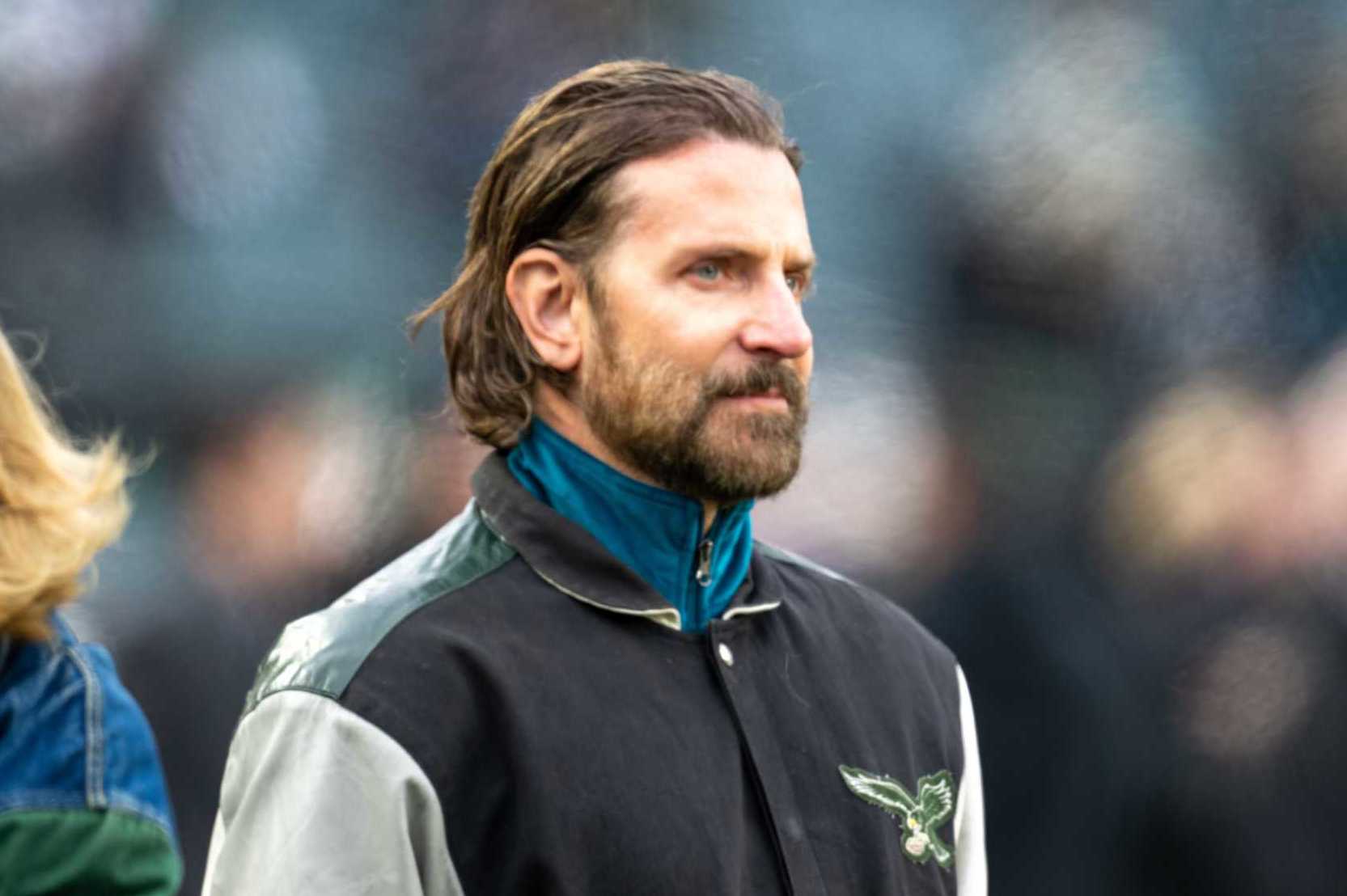 PHILADELPHIA, PA - JANUARY 19: Hollywood star Bradley Cooper watches practice before the NFC Divisional Playoff game between the Philadelphia Eagles and the Los Angeles Rams on January 19th, 2025 at Lincoln Financial Field in Philadelphia, PA. (Photo by Terence Lewis/Icon Sportswire via Getty Images)
