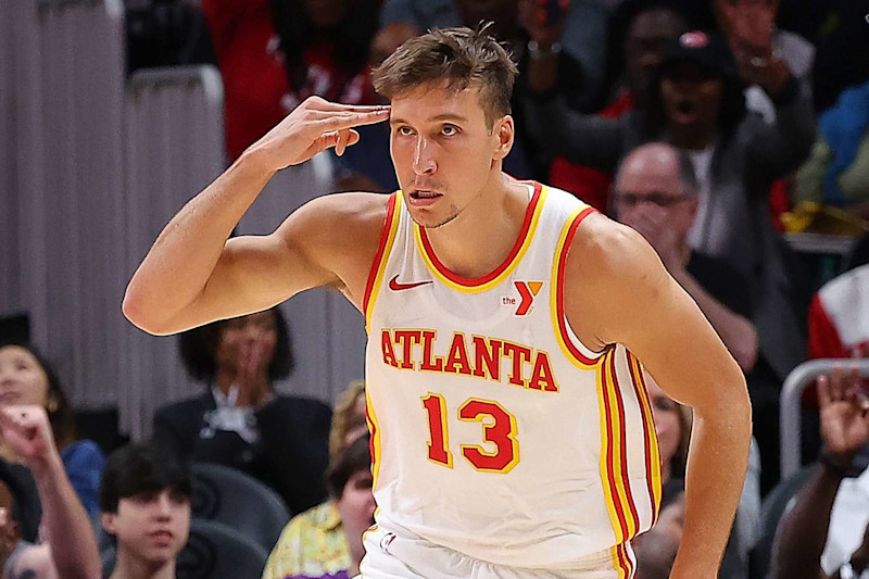 ATLANTA, GEORGIA - OCTOBER 14: Bogdan Bogdanovic #13 of the Atlanta Hawks reacts after a three-point basket against the Philadelphia 76ers during the second quarter at State Farm Arena on October 14, 2024 in Atlanta, Georgia. NOTE TO USER: User expressly acknowledges and agrees that, by downloading and/or using this photograph, user is consenting to the terms and conditions of the Getty Images License Agreement. (Photo by Kevin C. Cox/Getty Images)