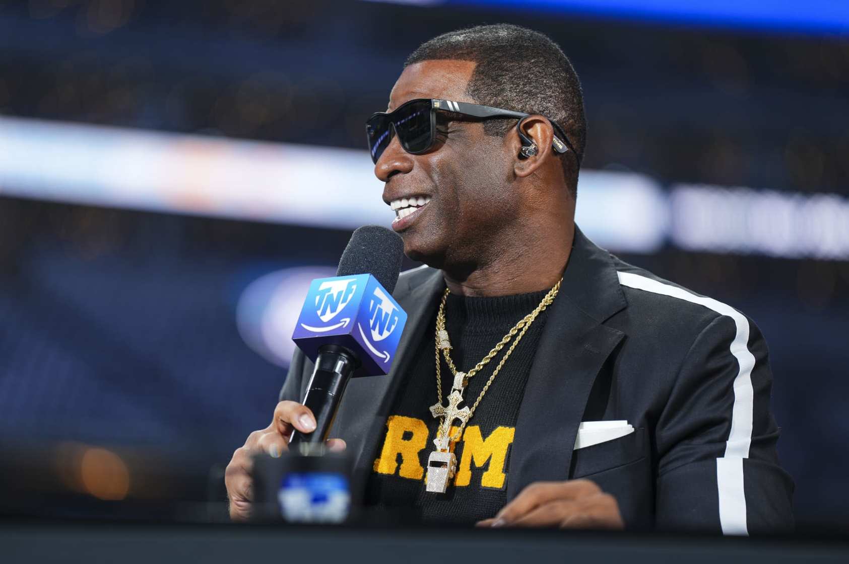 ARLINGTON, TX - NOVEMBER 30: Deion Sanders visits on set of the Amazon Prime TNF pregame show prior to an NFL football game between the Seattle Seahawks and the Dallas Cowboys at AT&T Stadium on November 30, 2023 in Arlington, Texas. (Photo by Cooper Neill/Getty Images)