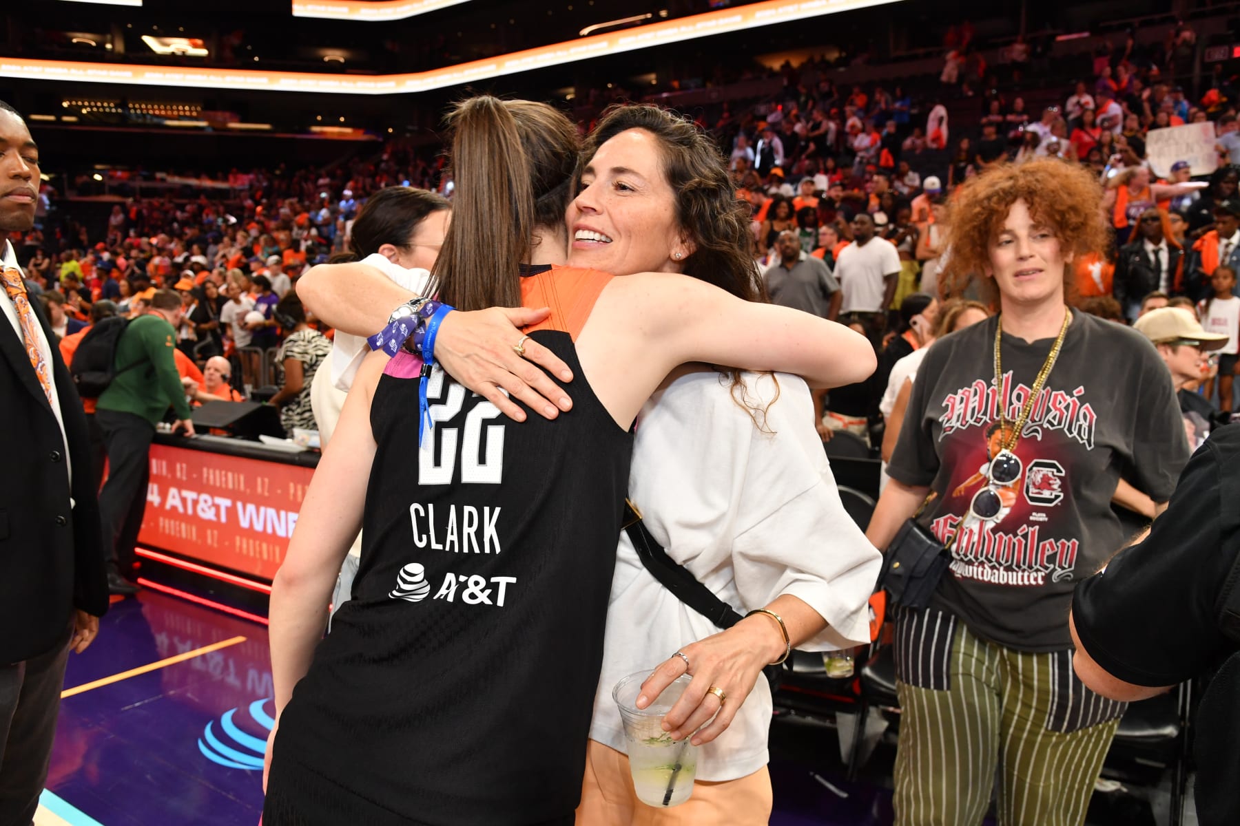 PHOENIX, AZ - JULY 20: Caitlin Clark #22 of Team WNBA and Sue Bird embrace after the game against the USA Basketball Women's National Team during the 2024 WNBA All Star Game on July 20, 2024 at Footprint Center in Phoenix, Arizona. NOTE TO USER: User expressly acknowledges and agrees that, by downloading and or using this photograph, user is consenting to the terms and conditions of the Getty Images License Agreement. Mandatory Copyright Notice: Copyright 2024 NBAE (Photo by Juan Ocampo/NBAE via Getty Images)