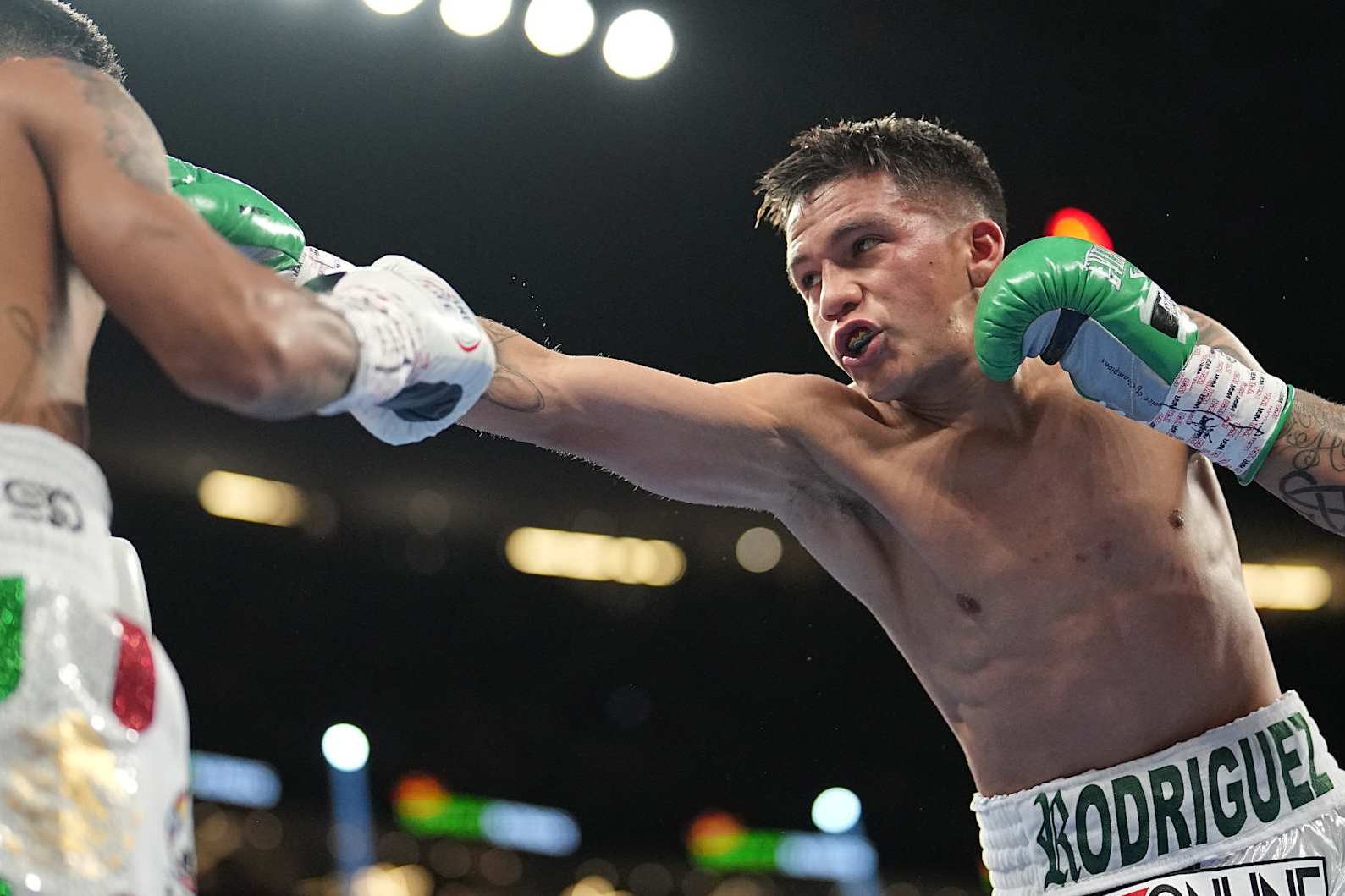Boxing: WBC World Super Flyweight Title: Jesse Rodriguez (R) in action, throws a punch vs Israel Gonzalez during fight at T-Mobile Arena.
Las Vegas, NV 9/17/2022
CREDIT: Erick W. Rasco (Photo by Erick W. Rasco/Sports Illustrated via Getty Images)
(Set Number: X164164 TK1)