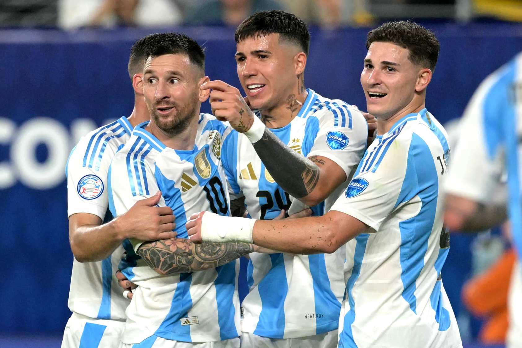 Argentina's forward #10 Lionel Messi celebrates scoring his team's second goal with teammates during the Conmebol 2024 Copa America tournament semi-final football match between Argentina and Canada at MetLife Stadium, in East Rutherford, New Jersey on July 9, 2024. (Photo by JUAN MABROMATA / AFP) (Photo by JUAN MABROMATA/AFP via Getty Images)