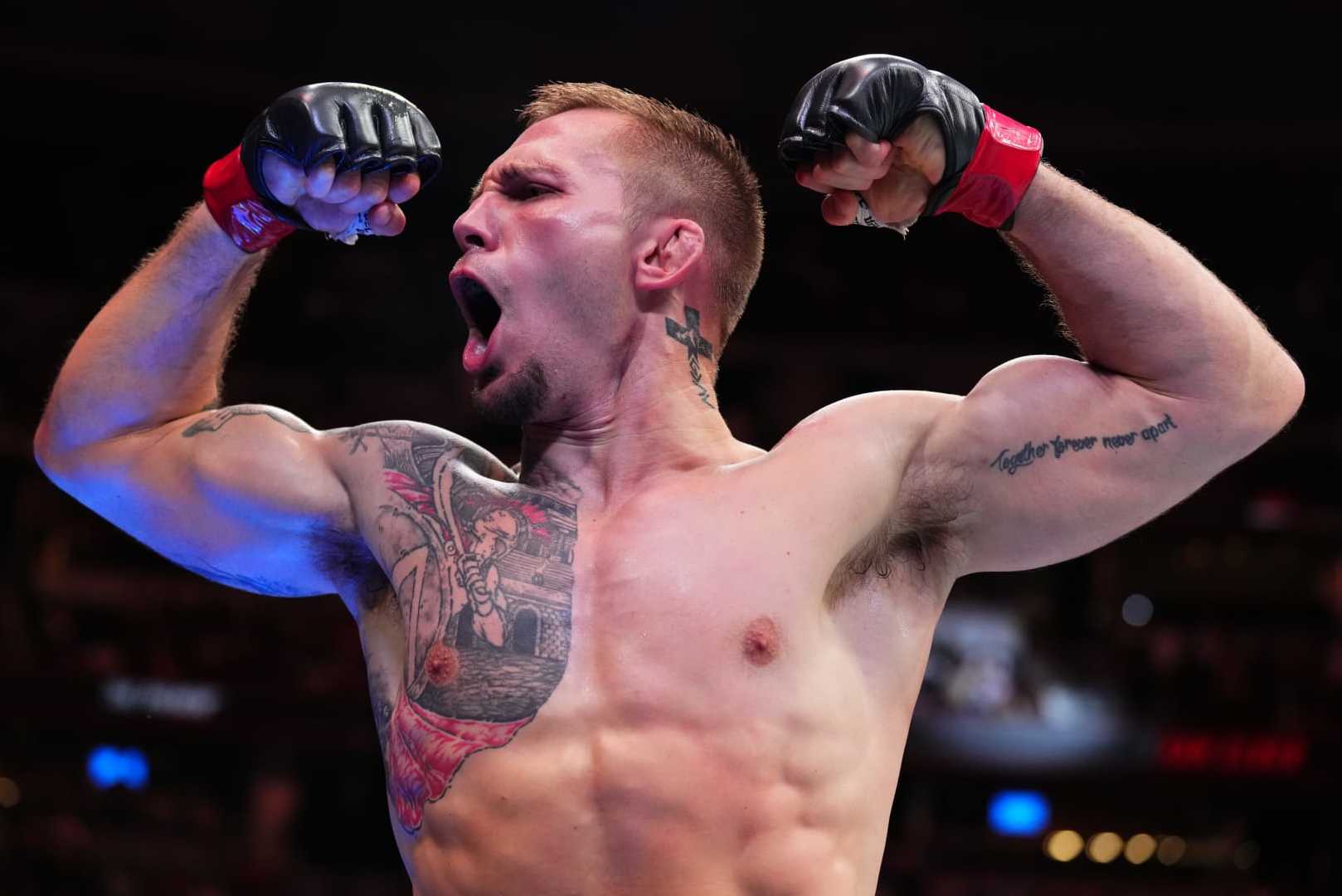 DENVER, COLORADO - JULY 13: Evan Elder reacts after his submission victory over Darrius Flowers in a welterweight fight during the UFC Fight Night event at Ball Arena on July 13, 2024 in Denver, Colorado. (Photo by Josh Hedges/Zuffa LLC via Getty Images)