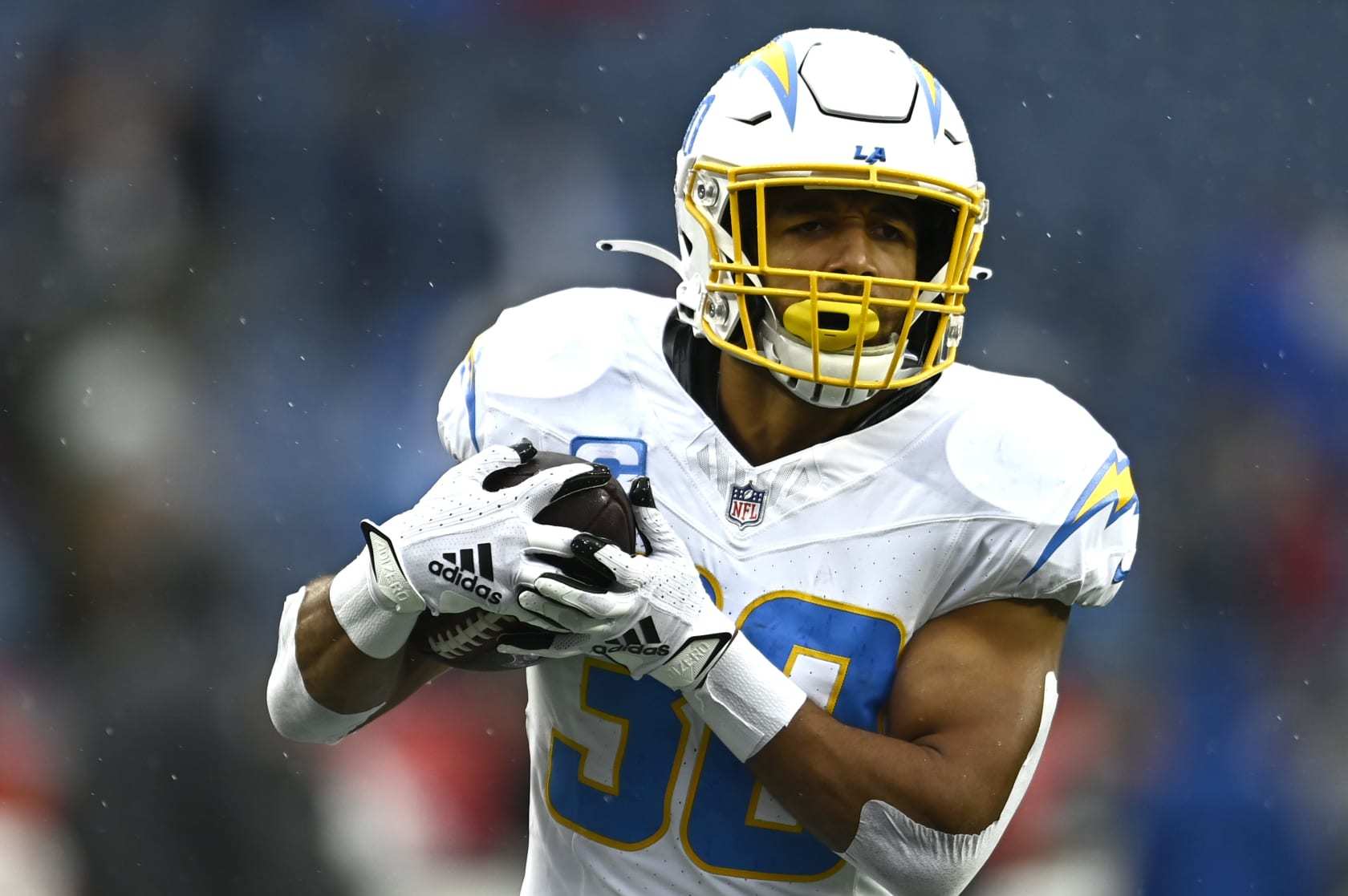 FOXBOROUGH, MASSACHUSETTS - DECEMBER 03: Austin Ekeler #30 of the Los Angeles Chargers warms up before the game against the New England Patriots at Gillette Stadium on December 03, 2023 in Foxborough, Massachusetts. (Photo by Billie Weiss/Getty Images)