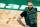 BOSTON, MASSACHUSETTS - APRIL 28: Evan Fournier #94 of the Boston Celtics looks on during the game against the Charlotte Hornets at TD Garden on April 28, 2021 in Boston, Massachusetts. NOTE TO USER: User expressly acknowledges and agrees that, by downloading and or using this photograph, User is consenting to the terms and conditions of the Getty Images License Agreement. (Photo by Maddie Meyer/Getty Images)