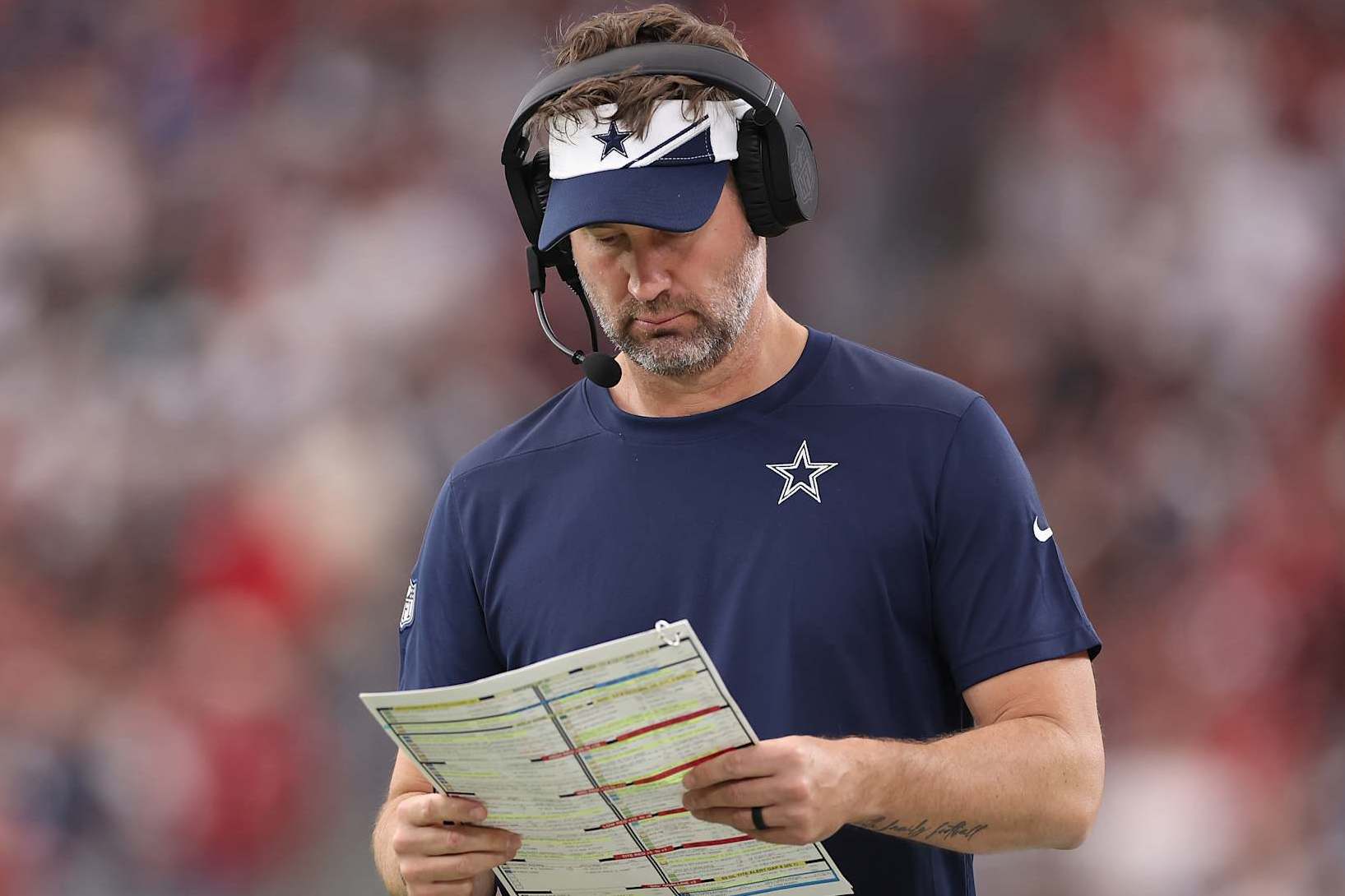 GLENDALE, ARIZONA - SEPTEMBER 24: Offensive coordinator Brian Schottenheimer of the Dallas Cowboys during the NFL game against the Arizona Cardinals at State Farm Stadium on September 24, 2023 in Glendale, Arizona.  The Cardinals defeated the Cowboys 28-16.  (Photo by Christian Petersen/Getty Images)