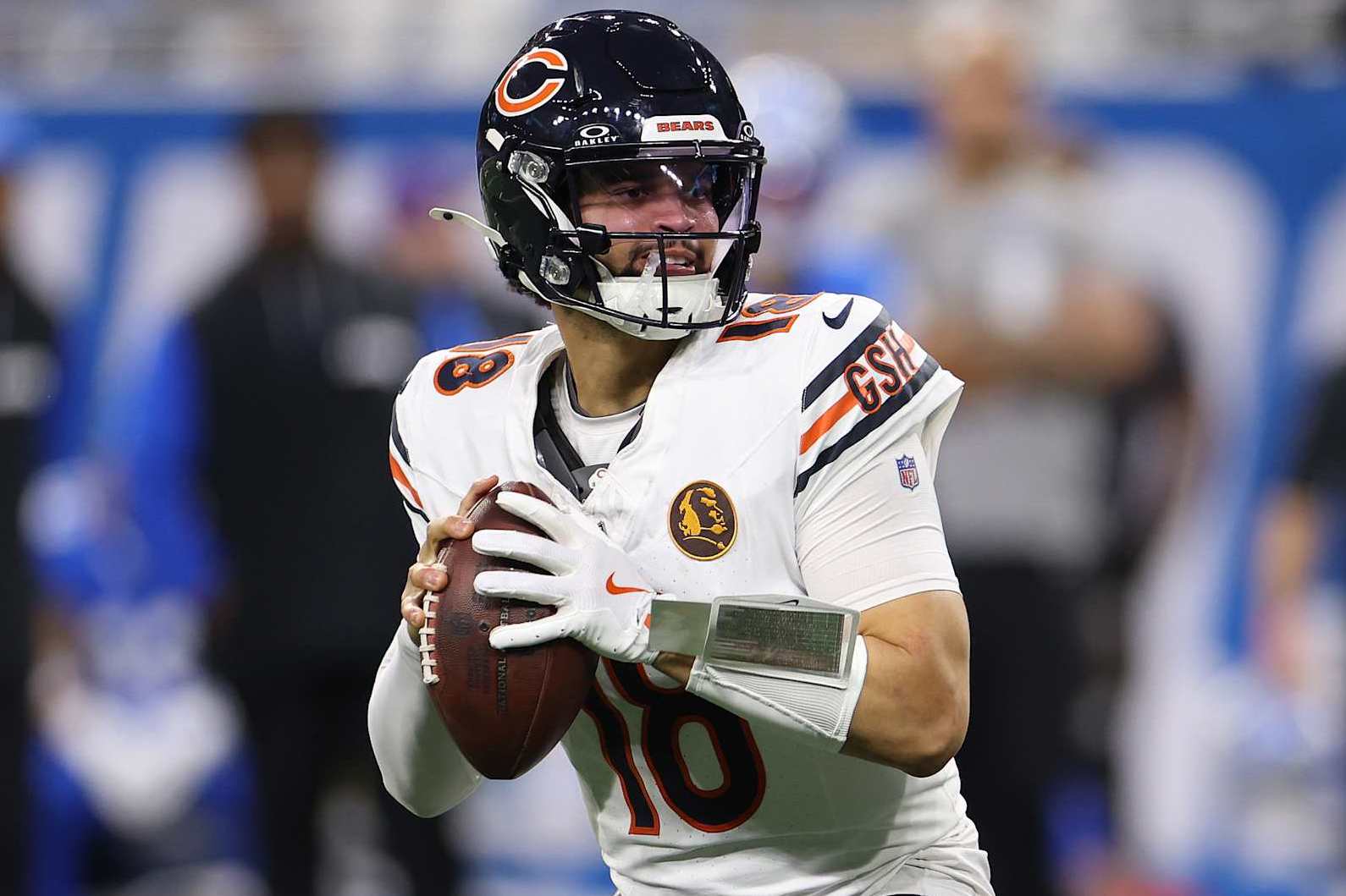 DETROIT, MICHIGAN - NOVEMBER 28: Quarterback Caleb Williams #18 of the Chicago Bears throws a pass during the third quarter of a game against the Detroit Lions at Ford Field on November 28, 2024 in Detroit, Michigan. (Photo by Mike Mulholland/Getty Images)