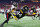 ATLANTA, GEORGIA - AUGUST 24: George Pickens #14 of the Pittsburgh Steelers leaps for a reception over Natrone Brooks #35 of the Atlanta Falcons during the first quarter of a preseason game at Mercedes-Benz Stadium on August 24, 2023 in Atlanta, Georgia. (Photo by Todd Kirkland/Getty Images)