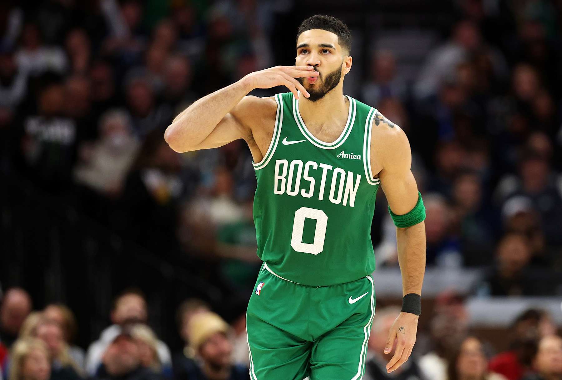 MINNEAPOLIS, MINNESOTA - JANUARY 02: Jayson Tatum #0 of the Boston Celtics celebrates his three-point basket against the Minnesota Timberwolves in the second quarter at Target Center on January 02, 2025 in Minneapolis, Minnesota. NOTE TO USER: User expressly acknowledges and agrees that, by downloading and or using this photograph, User is consenting to the terms and conditions of the Getty Images License Agreement. (Photo by David Berding/Getty Images)