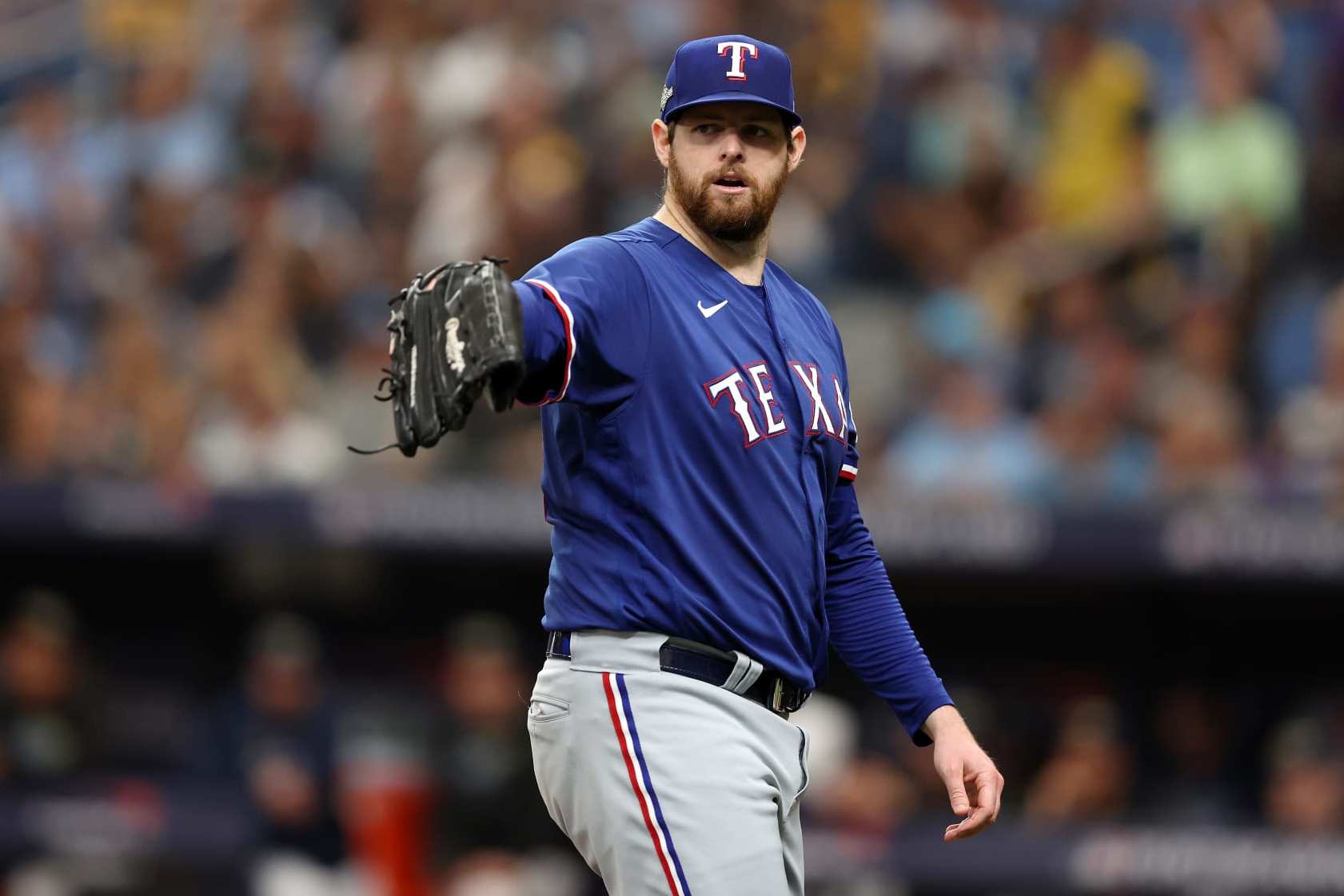 ST PETERSBURG, FLORIDA - OCTOBER 03: Jordan Montgomery #52 of the Texas Rangers reacts in the first inning against the Tampa Bay Rays during Game One of the Wild Card Series at Tropicana Field on October 03, 2023 in St Petersburg, Florida. (Photo by Megan Briggs/Getty Images)