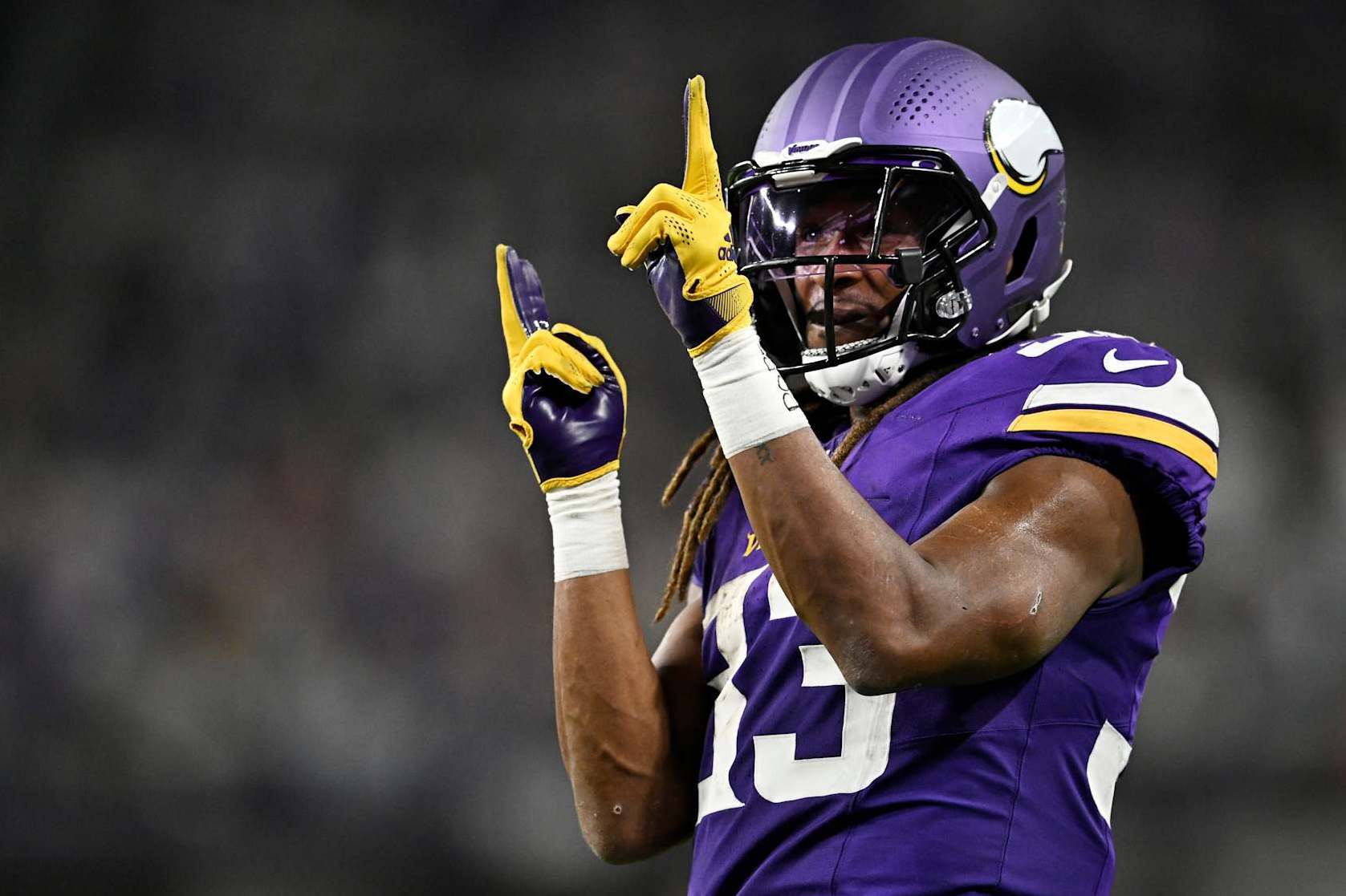 MINNEAPOLIS, MINNESOTA - DECEMBER 29: Aaron Jones #33 of the Minnesota Vikings reacts during the third quarter of a game against the Green Bay Packers at U.S. Bank Stadium on December 29, 2024 in Minneapolis, Minnesota. (Photo by Stephen Maturen/Getty Images)