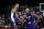 France's center Victor Wembanyama #32 (L), France's guard Matthew Strazel #85 (C) and France's forward Guerschon Yabusele #7 (R) react during the exhibition game between France and Serbia ahead of the Paris 2024 Olympic Games, in the LDLC Arena in Decines-Charpieu, eastern France, on July 12, 2024. (Photo by MAXIME GRUSS / AFP) (Photo by MAXIME GRUSS/AFP via Getty Images)