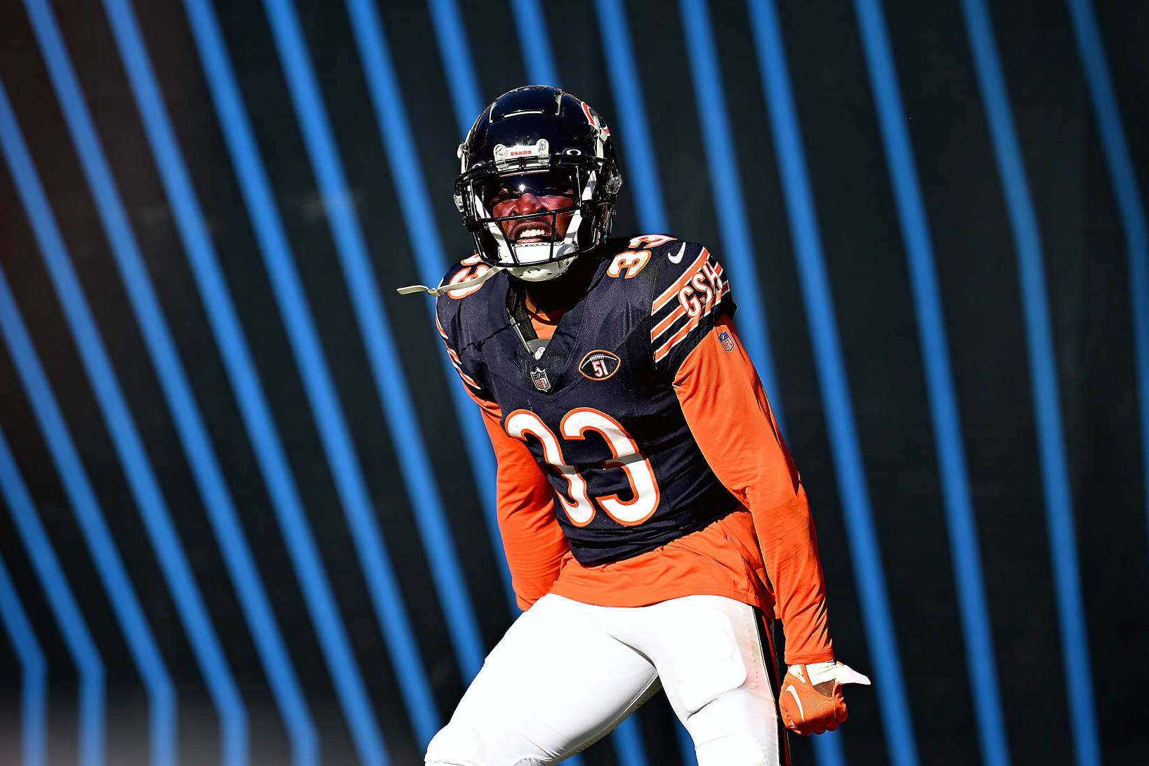 CHICAGO, ILLINOIS - OCTOBER 22: Jaylon Johnson #33 of the Chicago Bears reacts after an interception during the second half against the Las Vegas Raiders at Soldier Field on October 22, 2023 in Chicago, Illinois. (Photo by Quinn Harris/Getty Images)