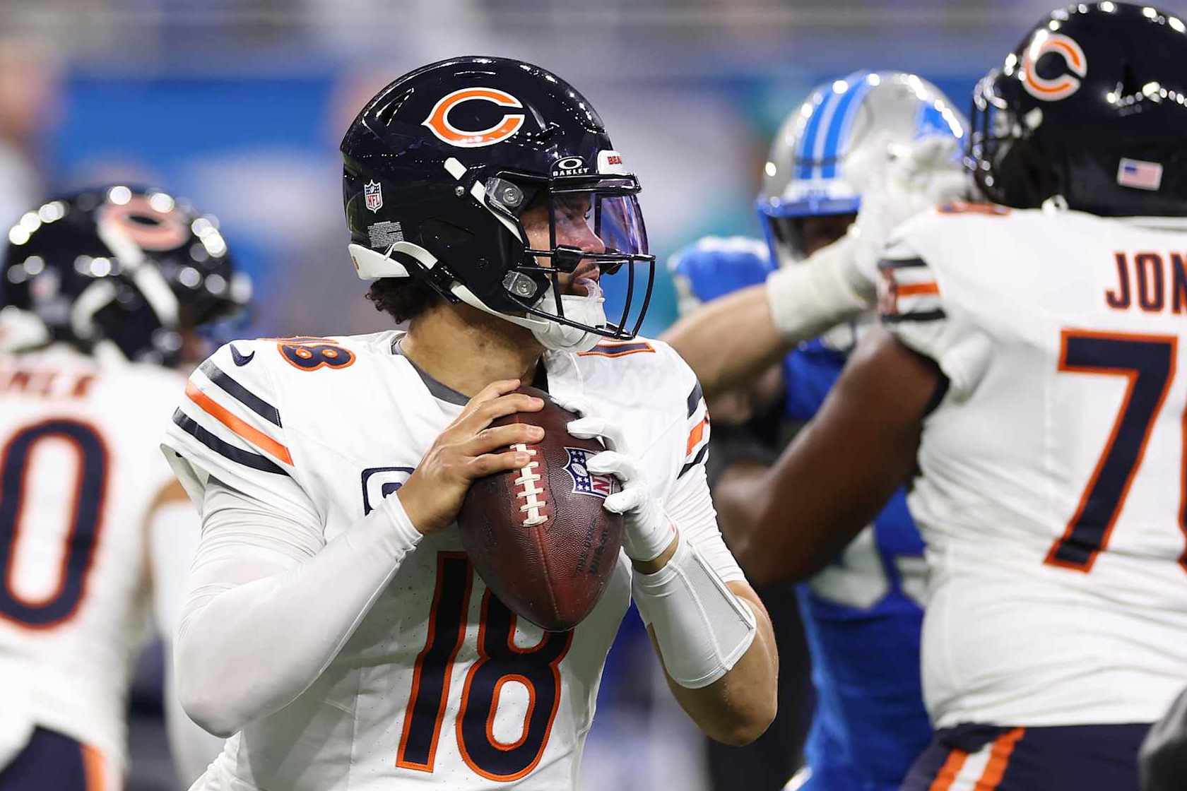 DETROIT, MICHIGAN - NOVEMBER 28: Quarterback Caleb Williams #18 of the Chicago Bears looks to pass during the third quarter against the Detroit Lions at Ford Field on November 28, 2024 in Detroit, Michigan. (Photo by Mike Mulholland/Getty Images)