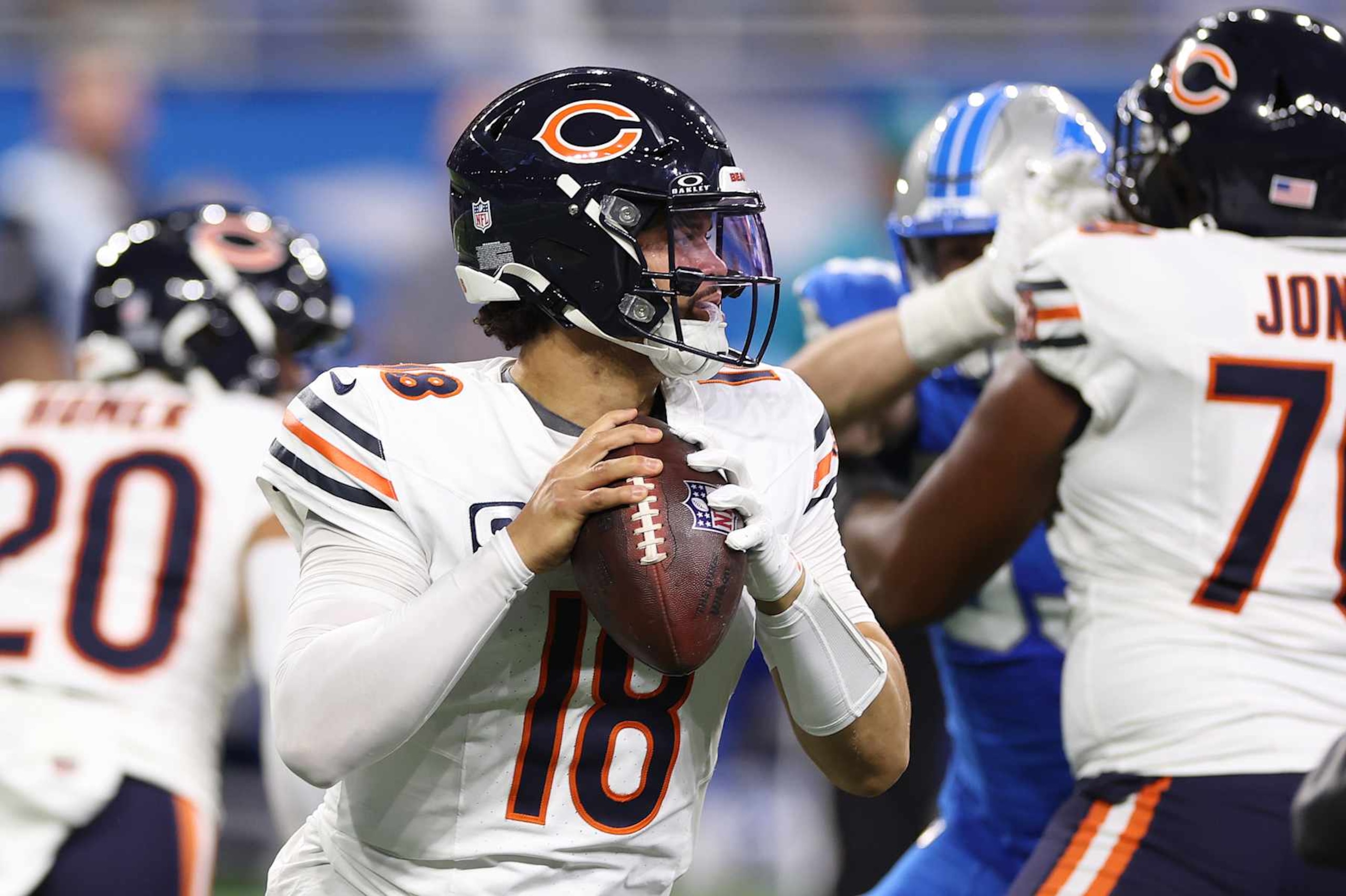 DETROIT, MICHIGAN - NOVEMBER 28: Quarterback Caleb Williams #18 of the Chicago Bears looks to pass during the third quarter against the Detroit Lions at Ford Field on November 28, 2024 in Detroit, Michigan. (Photo by Mike Mulholland/Getty Images)