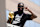 BOSTON, MA - JUNE 21: Boston Celtics SG Jaylen Brown celebrates the Boston Celtics' 18th NBA Championship during a duck boat parade. (Photo by Kayla Bartkowski/The Boston Globe via Getty Images)