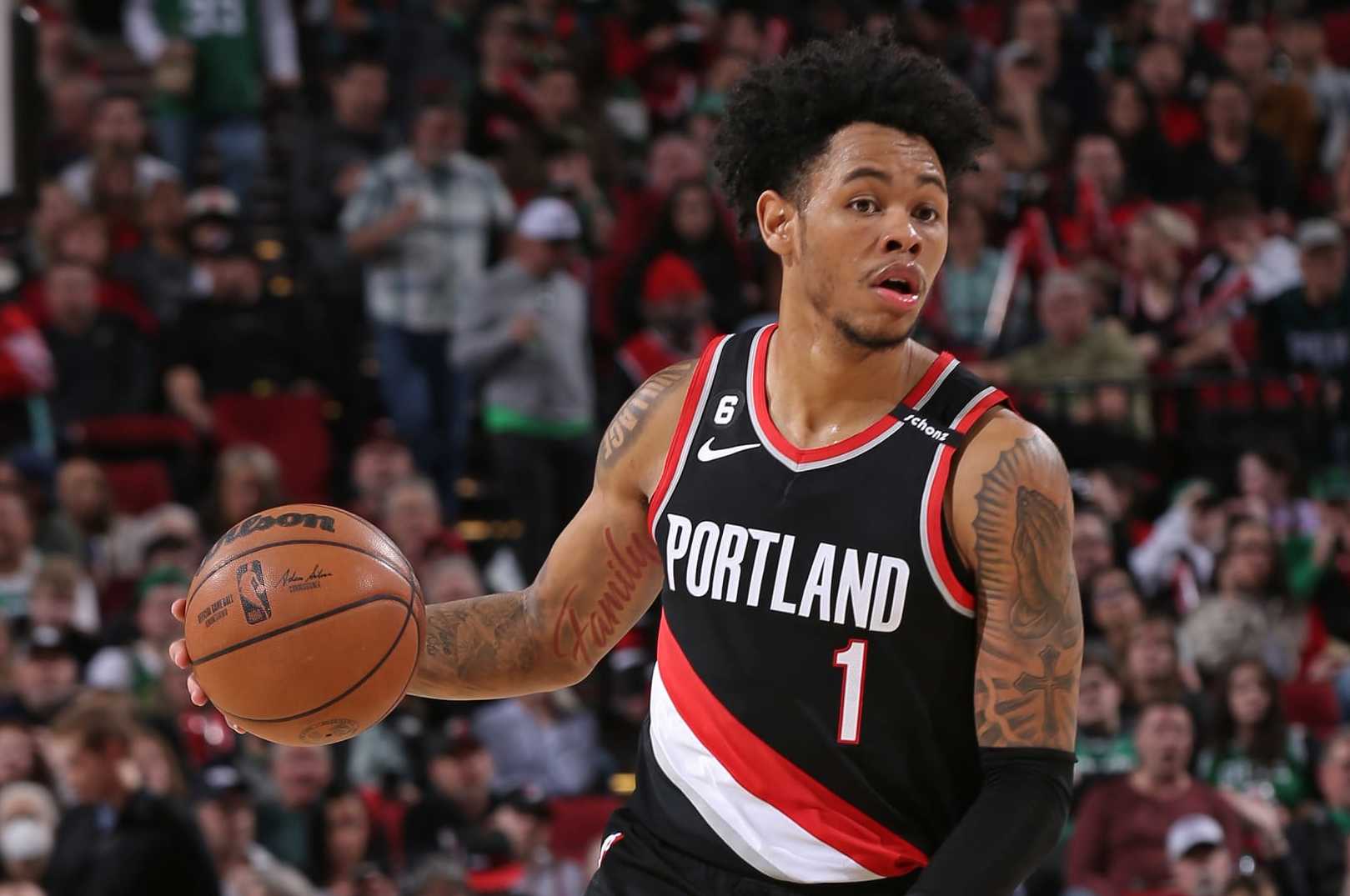 PORTLAND, OR - MARCH 17: Anfernee Simons #1 of the Portland Trail Blazers dribbles the ball during the game against the Boston Celtics on March 17, 2023 at the Moda Center Arena in Portland, Oregon. NOTE TO USER: User expressly acknowledges and agrees that, by downloading and or using this photograph, user is consenting to the terms and conditions of the Getty Images License Agreement. Mandatory Copyright Notice: Copyright 2023 NBAE (Photo by Cameron Browne/NBAE via Getty Images) PORTLAND, OR - MARCH 17: Anfernee Simons #1 of the Portland Trail Blazers dribbles the ball during the game against the Boston Celtics on March 17, 2023 at the Moda Center Arena in Portland, Oregon. NOTE TO USER: User expressly acknowledges and agrees that, by downloading and or using this photograph, user is consenting to the terms and conditions of the Getty Images License Agreement. Mandatory Copyright Notice: Copyright 2023 NBAE (Photo by Cameron Browne/NBAE via Getty Images)